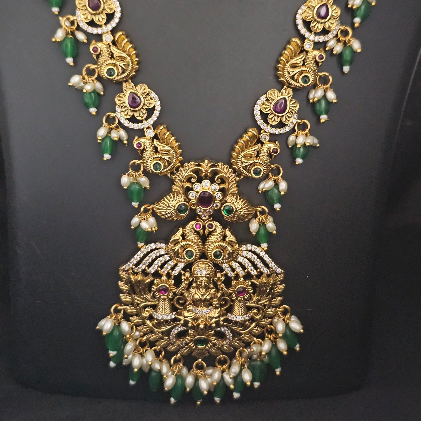 Lakshmi Peacock Premium quality Gold Jewelry Replica Haram with Precious green bead hangings with matching Earrings - MK Fashionkart