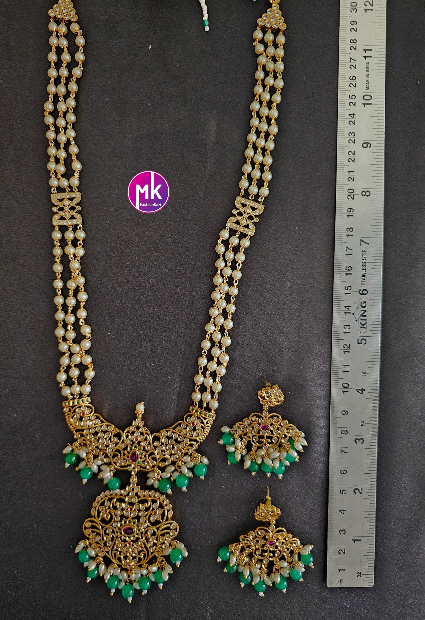 Beautiful Matte gold finish AD and kemp stones long Mala with matching Earrings - Bridal Haram - MK Fashionkart