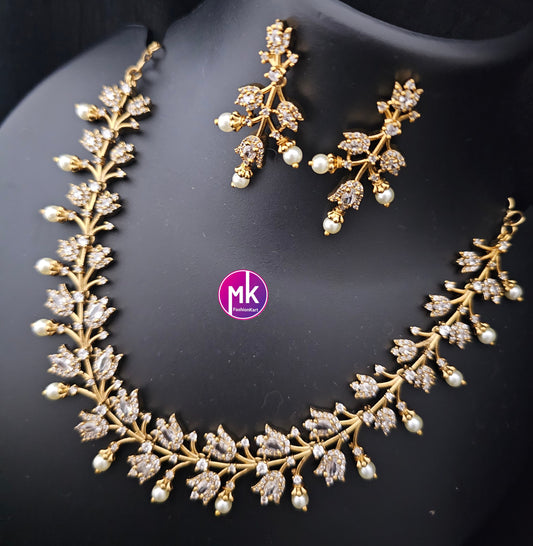 Beautiful design Gold finish AD stone necklace with matching Earrings - Trendy Necklace - MK Fashionkart