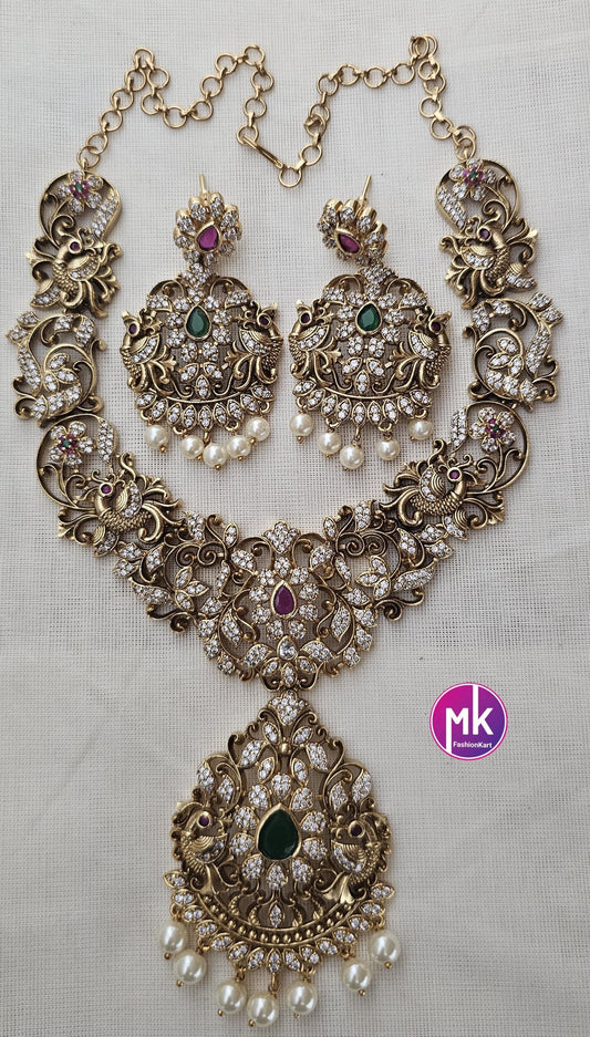 Peacock design Premium Quality Matte gold finish Kemp stone Necklace with pendent and matching Big Earrings - Bridal Jewelry - MK Fashionkart