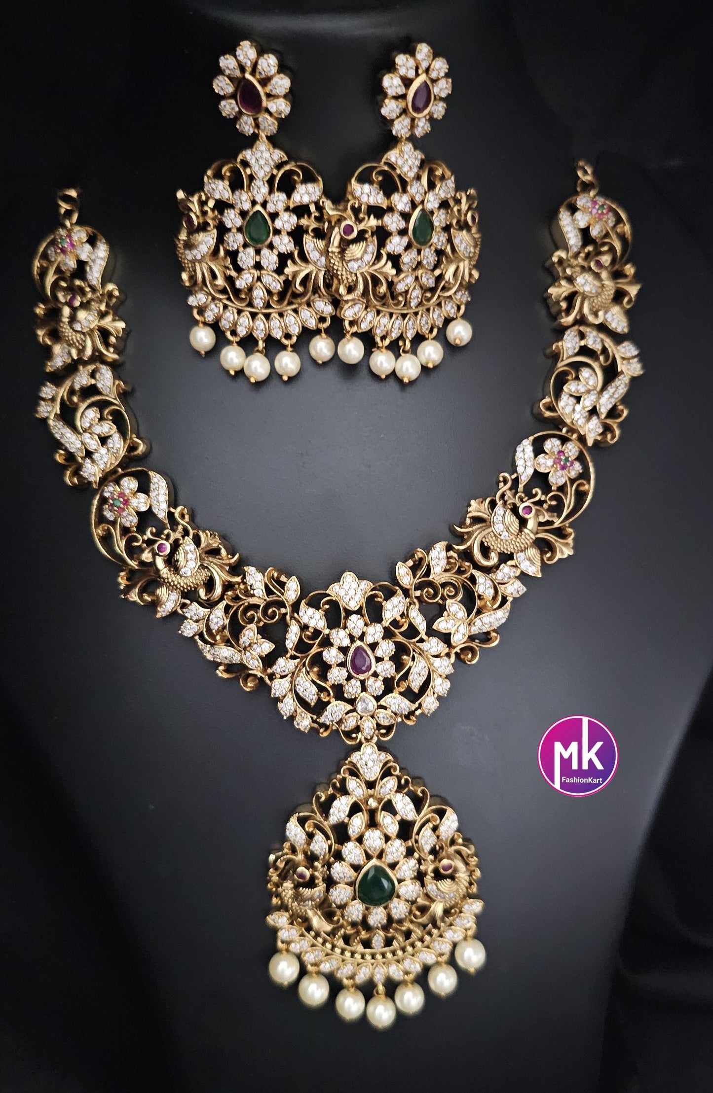 Peacock design Premium Quality Matte gold finish Kemp stone Necklace with pendent and matching Big Earrings - Bridal Jewelry - MK Fashionkart