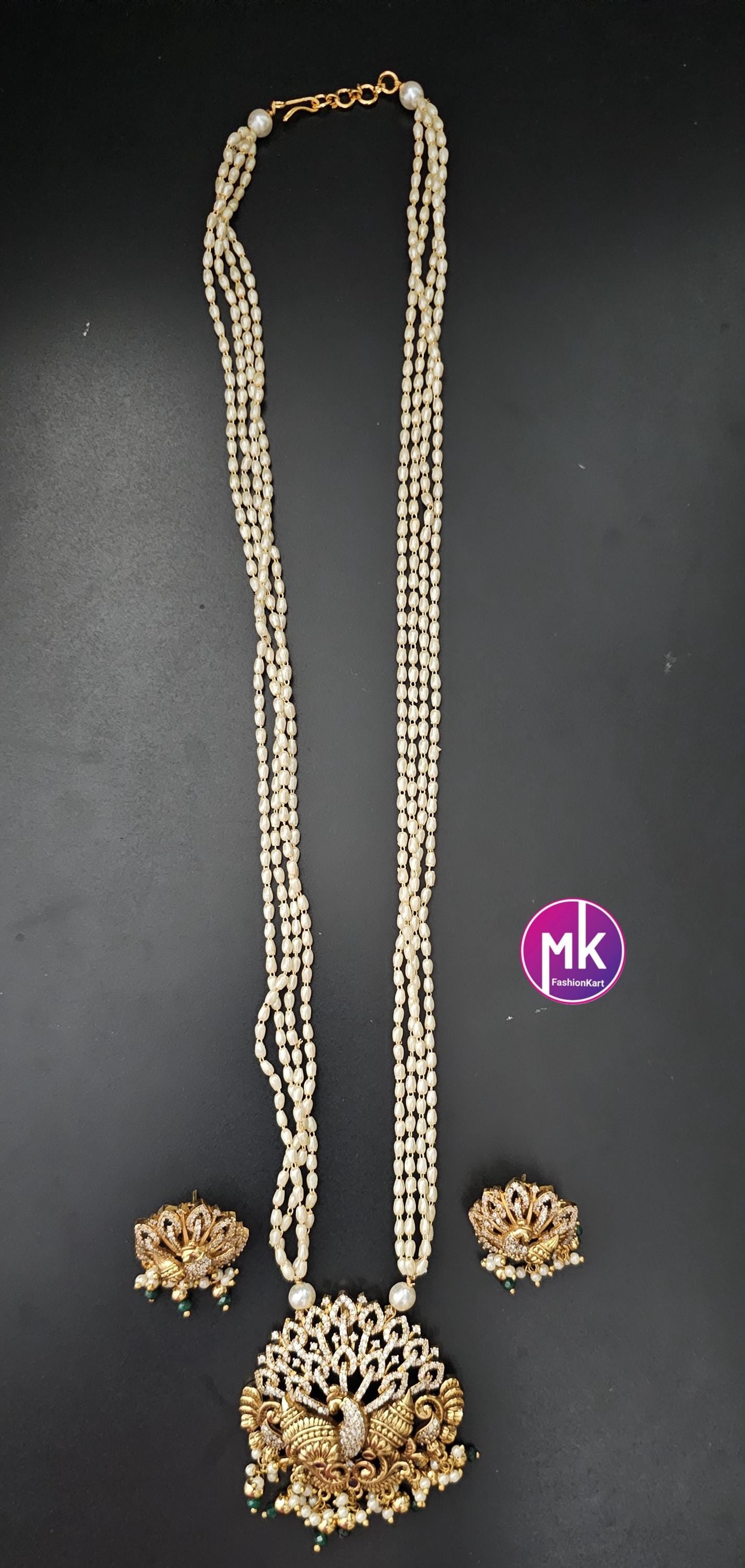 Peacock Matte gold finish CZ/AD stone long Mala with rice pearls and matching beautiful Earrings - Peacock mala - MK Fashionkart