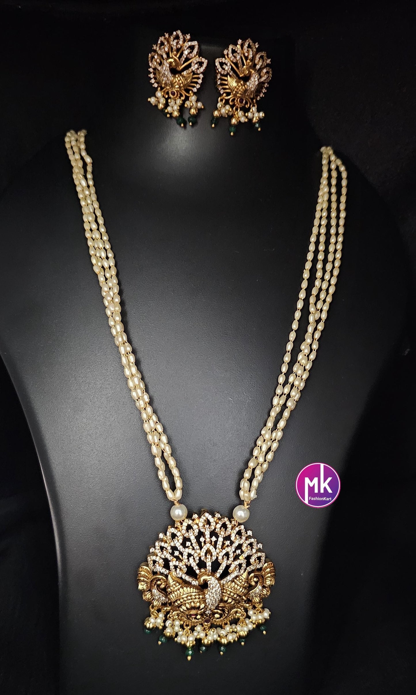Peacock Matte gold finish CZ/AD stone long Mala with rice pearls and matching beautiful Earrings - Peacock mala - MK Fashionkart