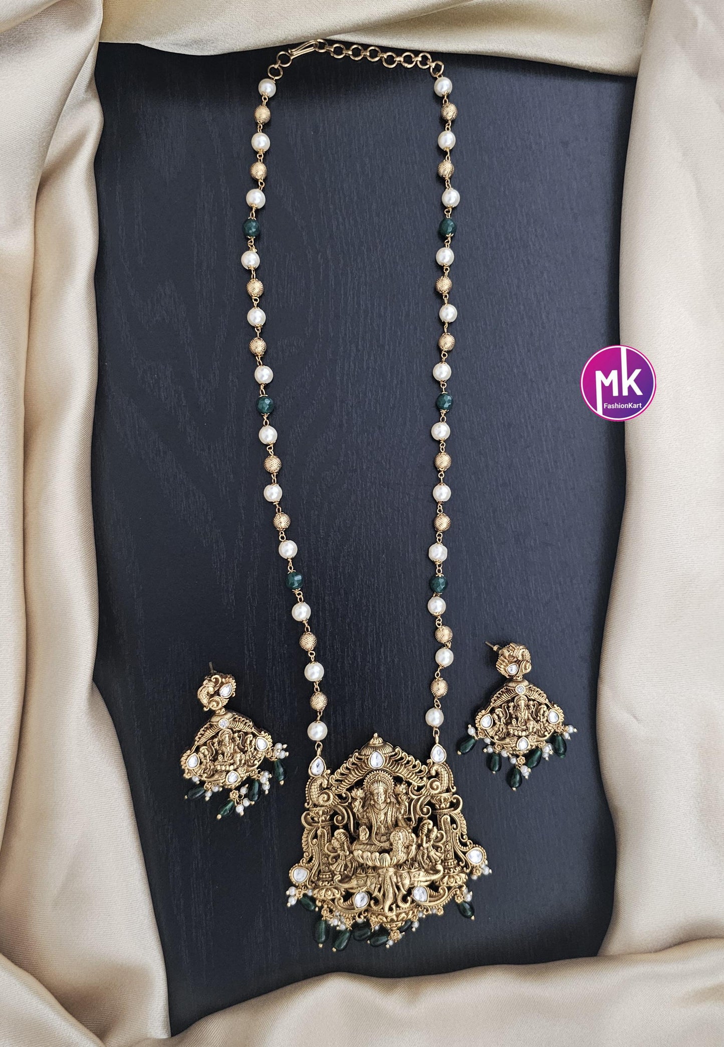 Celebrity Style Lakshmi Matte gold finish AD stones Big Pendent with and pearls, gold bead mala - Bridal Jewelry - MK Fashionkart