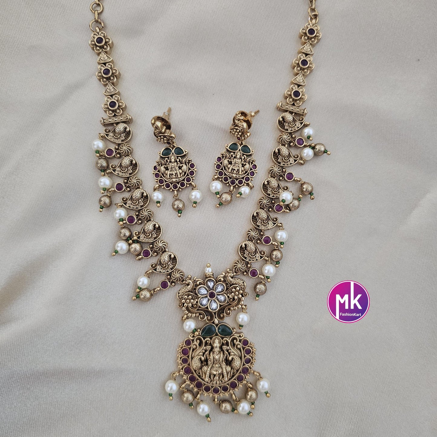 Lakshmi peacock design Premium Quality Matte gold finish Necklace w matching Earrings - Bridal Haram - Gold Jewelry Replica - MK Fashionkart