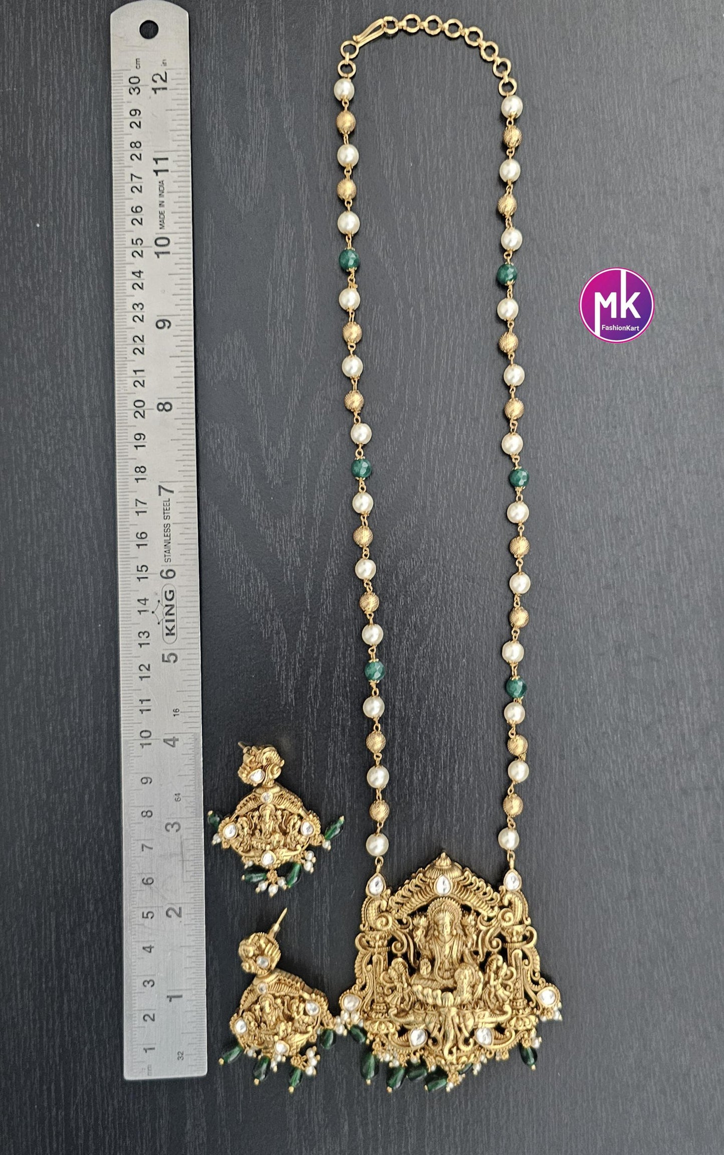 Celebrity Style Lakshmi Matte gold finish AD stones Big Pendent with and pearls, gold bead mala - Bridal Jewelry - MK Fashionkart