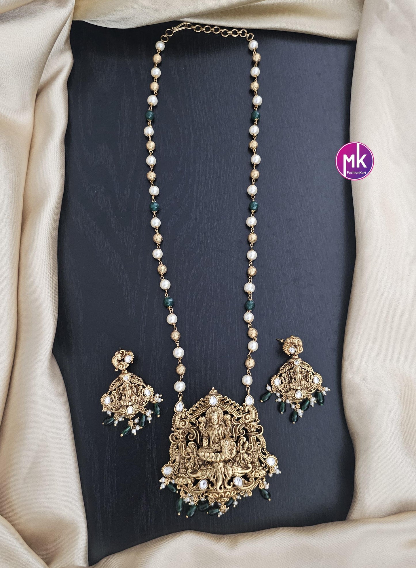 Celebrity Style Lakshmi Matte gold finish AD stones Big Pendent with and pearls, gold bead mala - Bridal Jewelry - MK Fashionkart