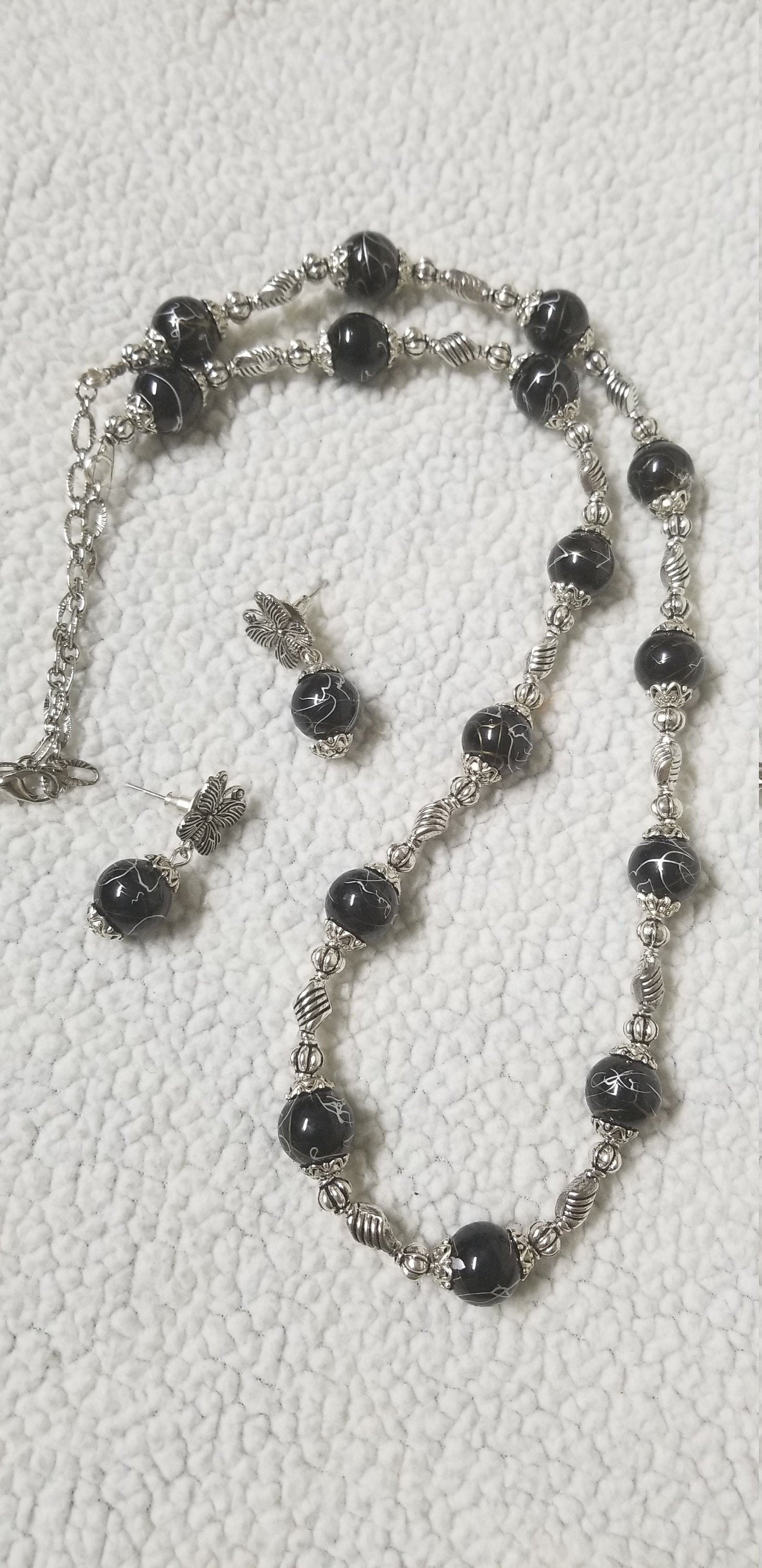 Black with silver line bead with german silver bead and butterfly earrings