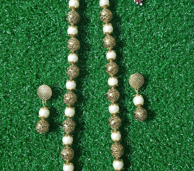 Antique and Pearl bead long chain with matching earrings