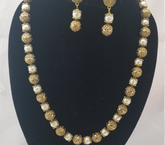 Antique and Pearl bead long chain with matching earrings