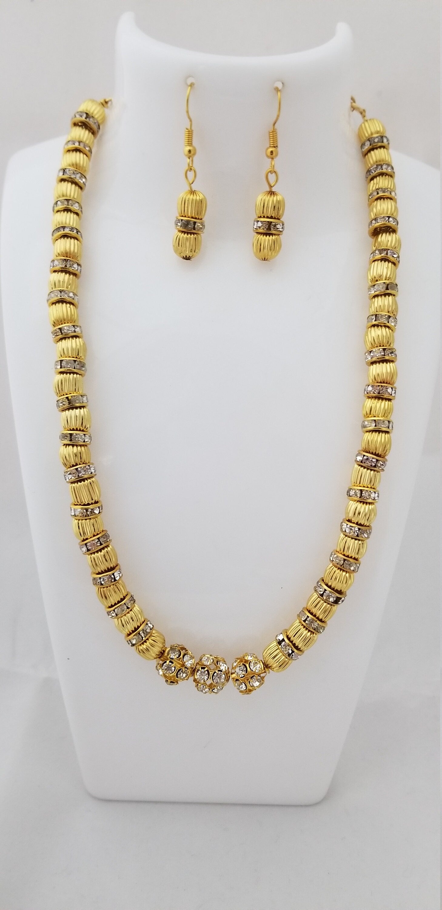 Gold bead with Rhinestone with matching Earrings