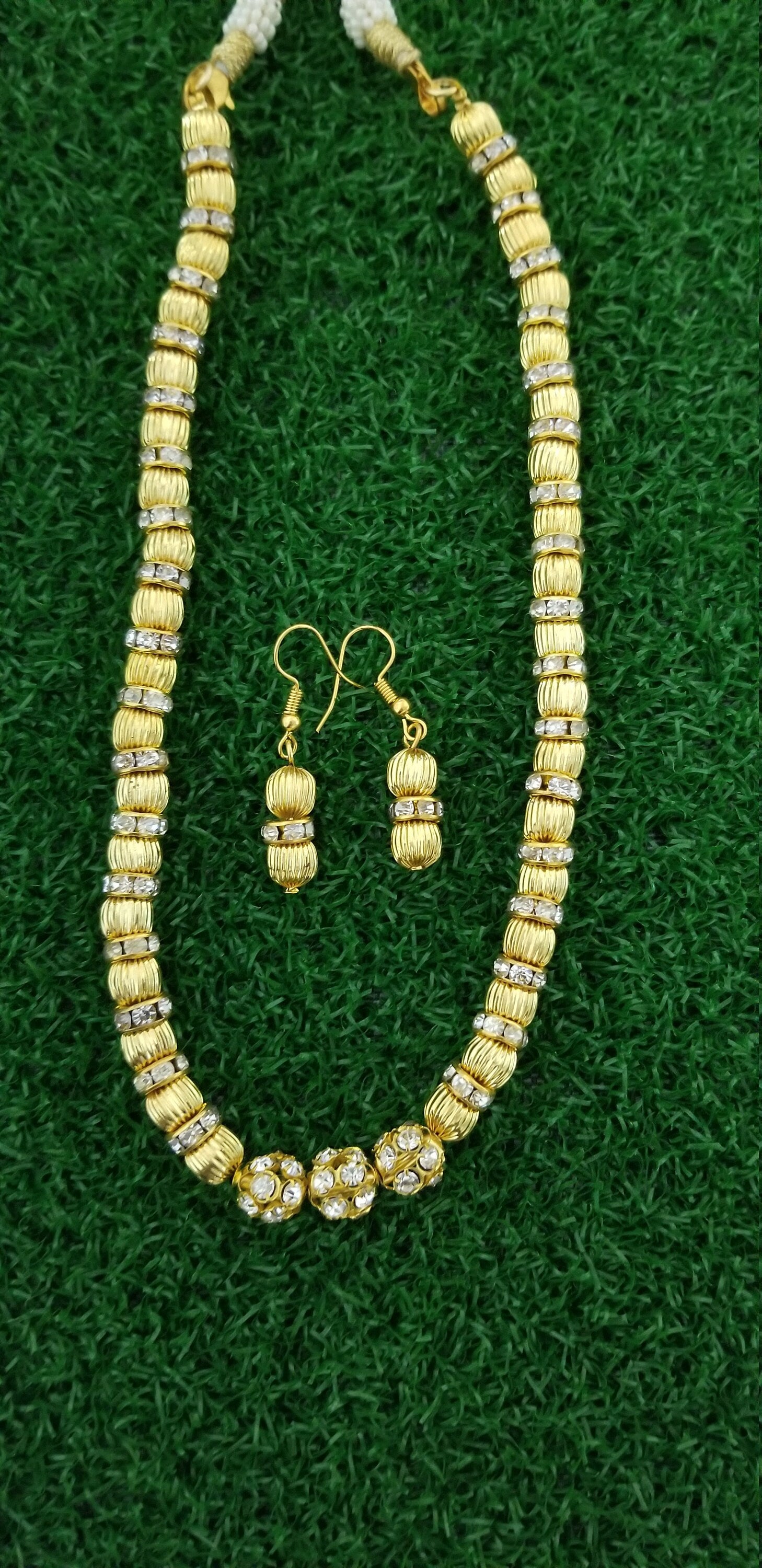 Gold bead with Rhinestone with matching Earrings
