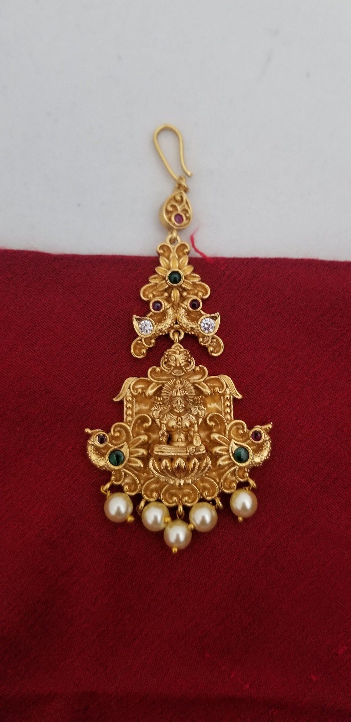 Lakshmi Peacock Gold finish AD stone Multi-color with Pearl hangings Tikka/Nethichutti
