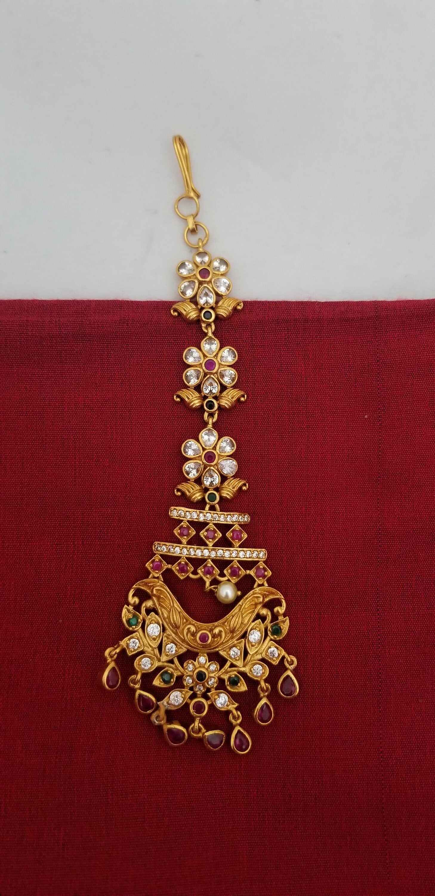 Flower design Gold finish AD stone Multi-color with Pink stone hangings Tikka/Nethichutti