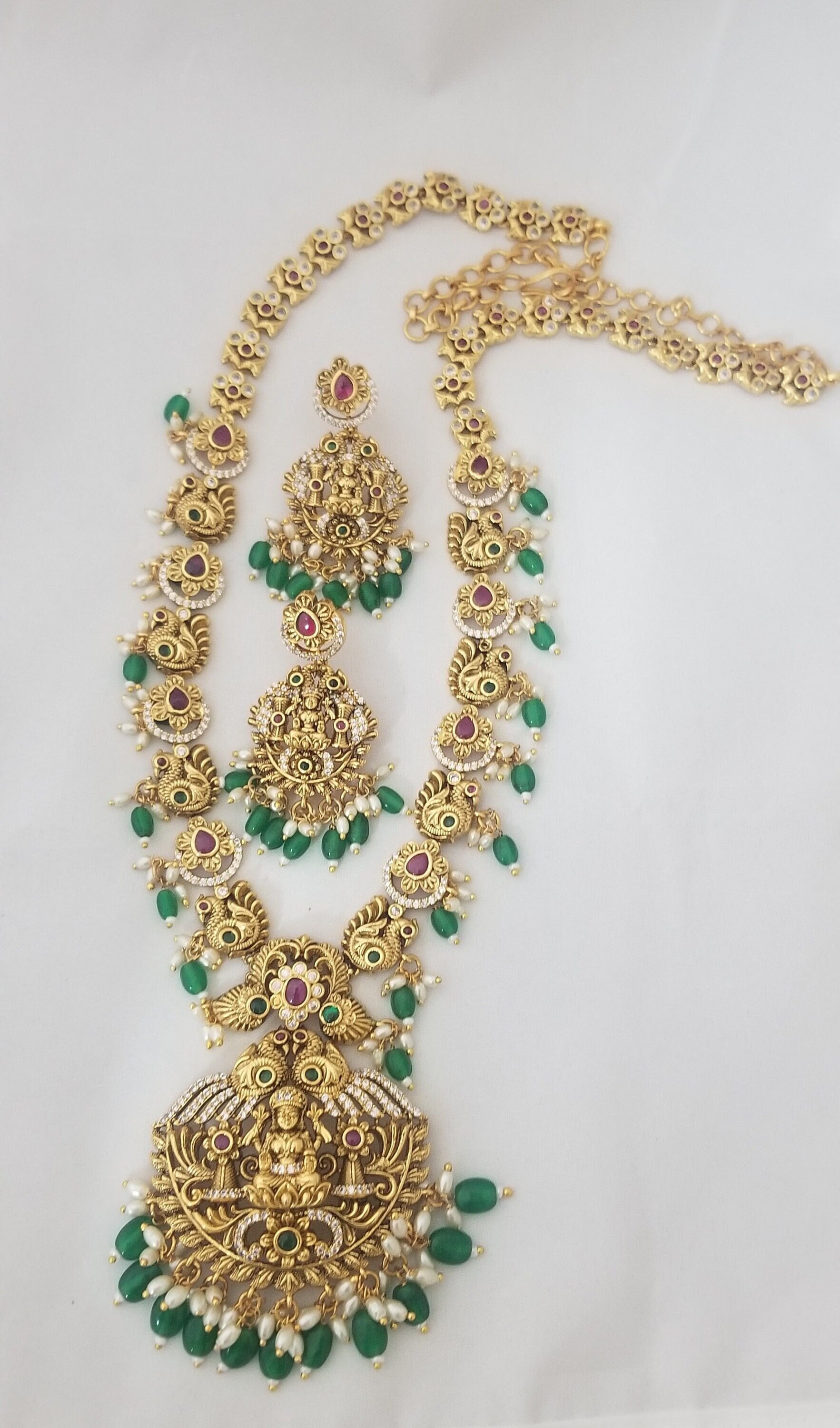 Lakshmi Peacock Premium quality Gold Jewelry Replica Haram with Precious green bead hangings with matching Earrings
