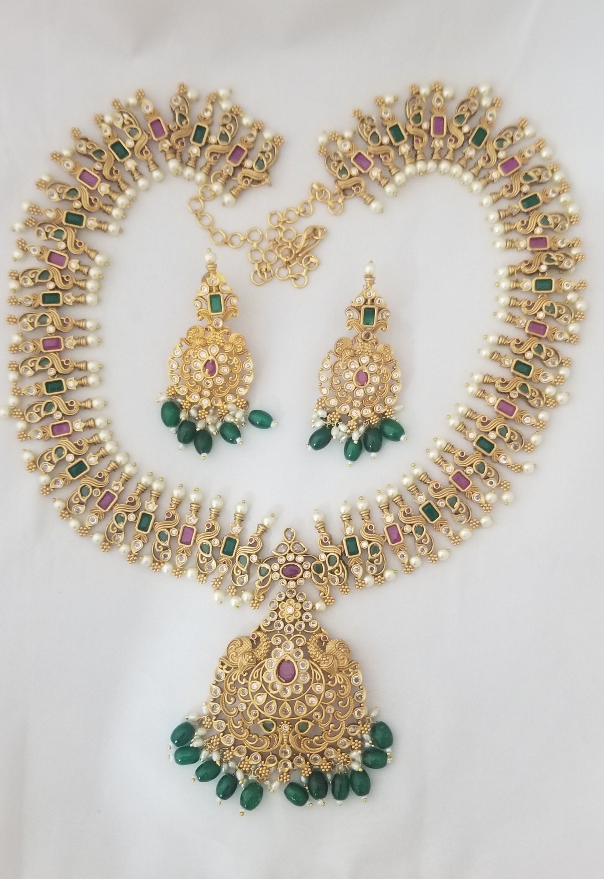 Peacock Premium quality Gold Jewelry Replica Haram with precious green bead hangings with matching Earrings