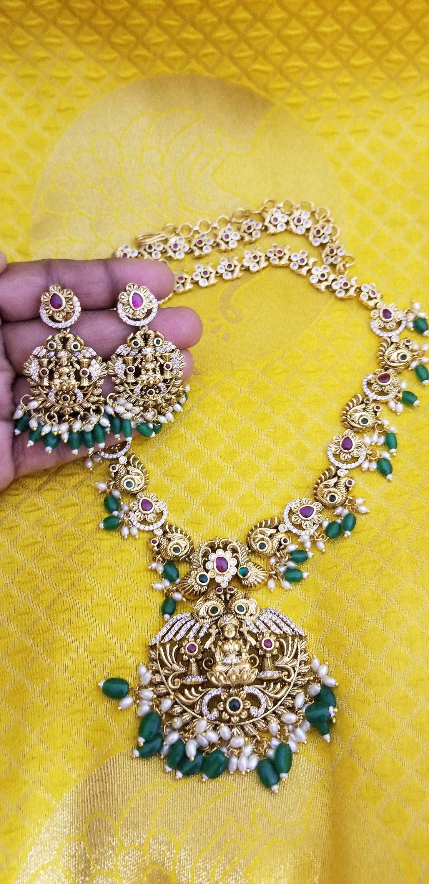 Lakshmi Peacock Premium quality Gold Jewelry Replica Haram with Precious green bead hangings with matching Earrings