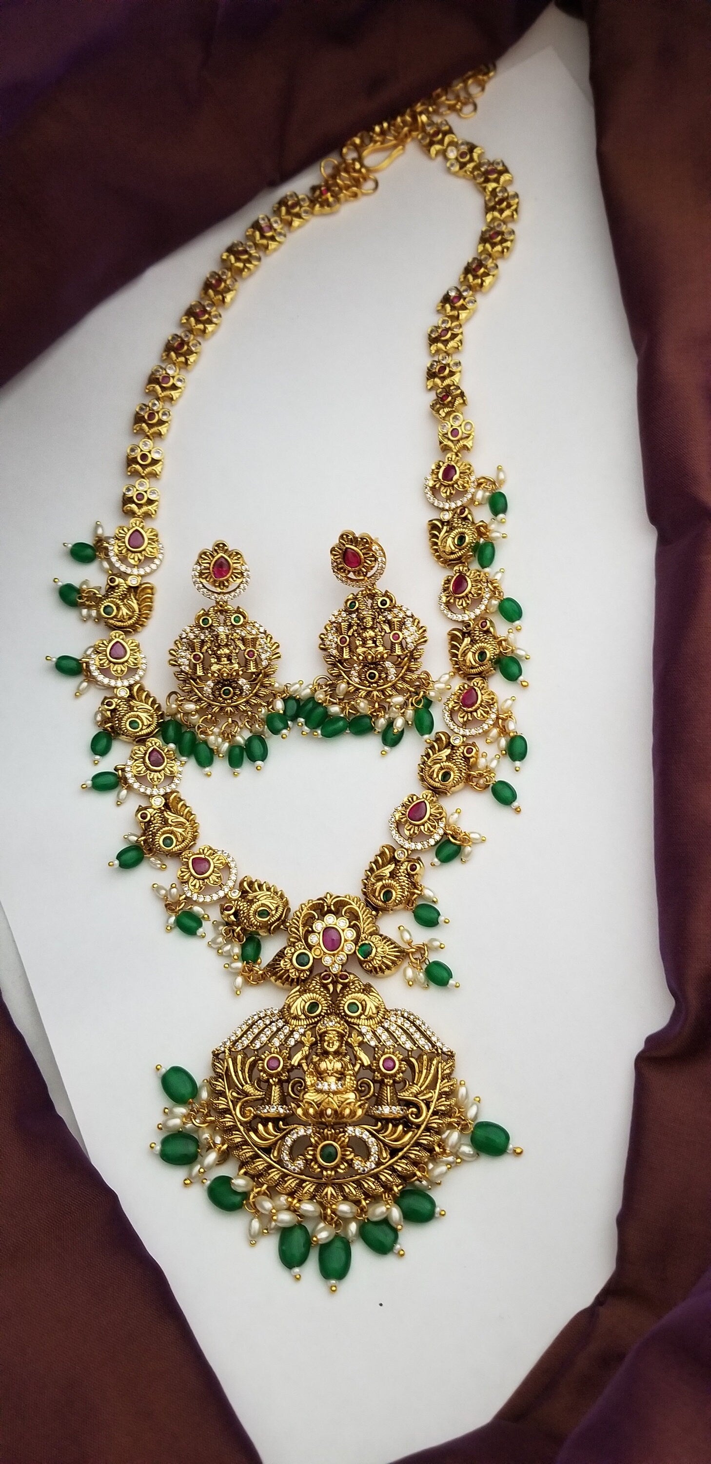 Lakshmi Peacock Premium quality Gold Jewelry Replica Haram with Precious green bead hangings with matching Earrings
