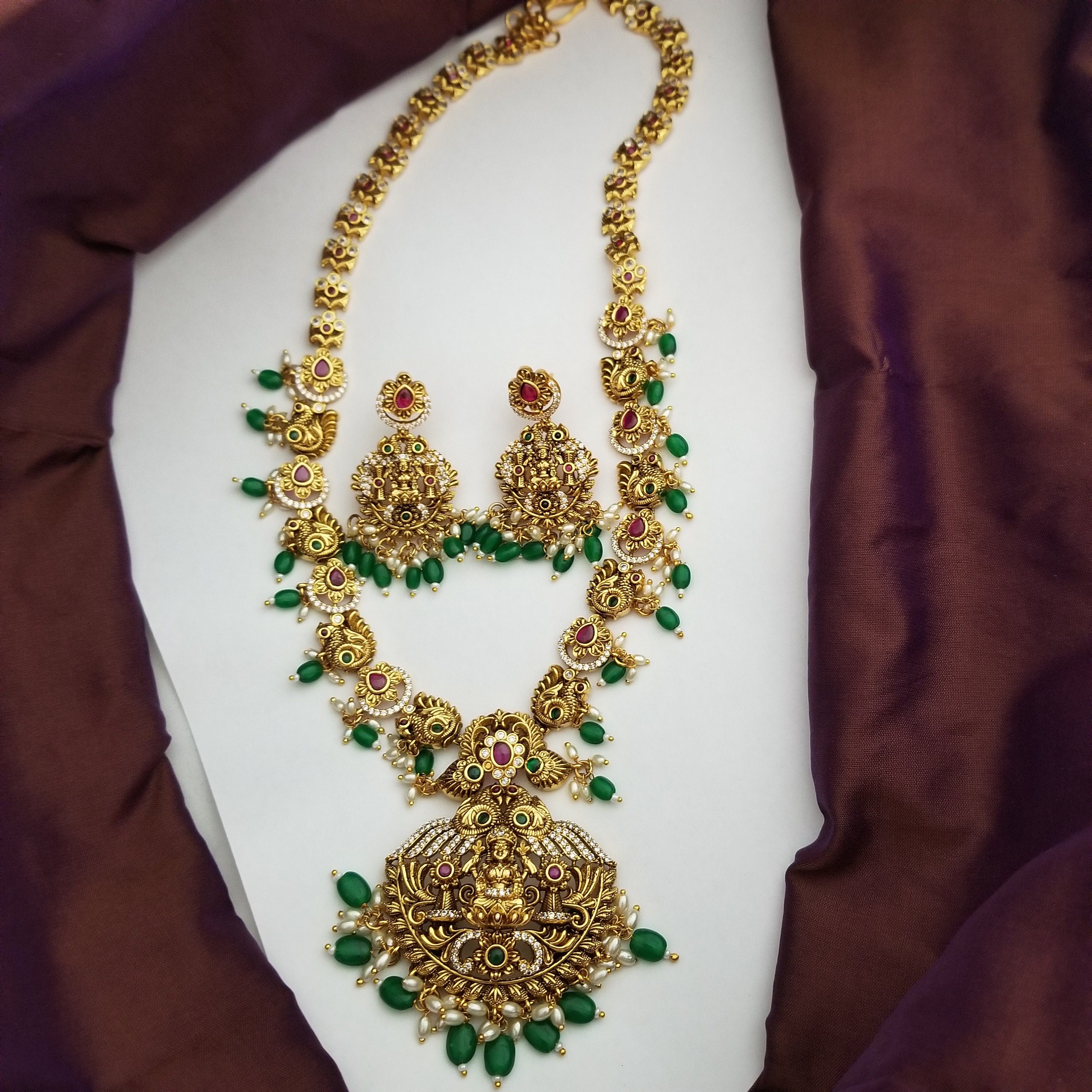 Lakshmi Peacock Premium quality Gold Jewelry Replica Haram with Precious green bead hangings with matching Earrings