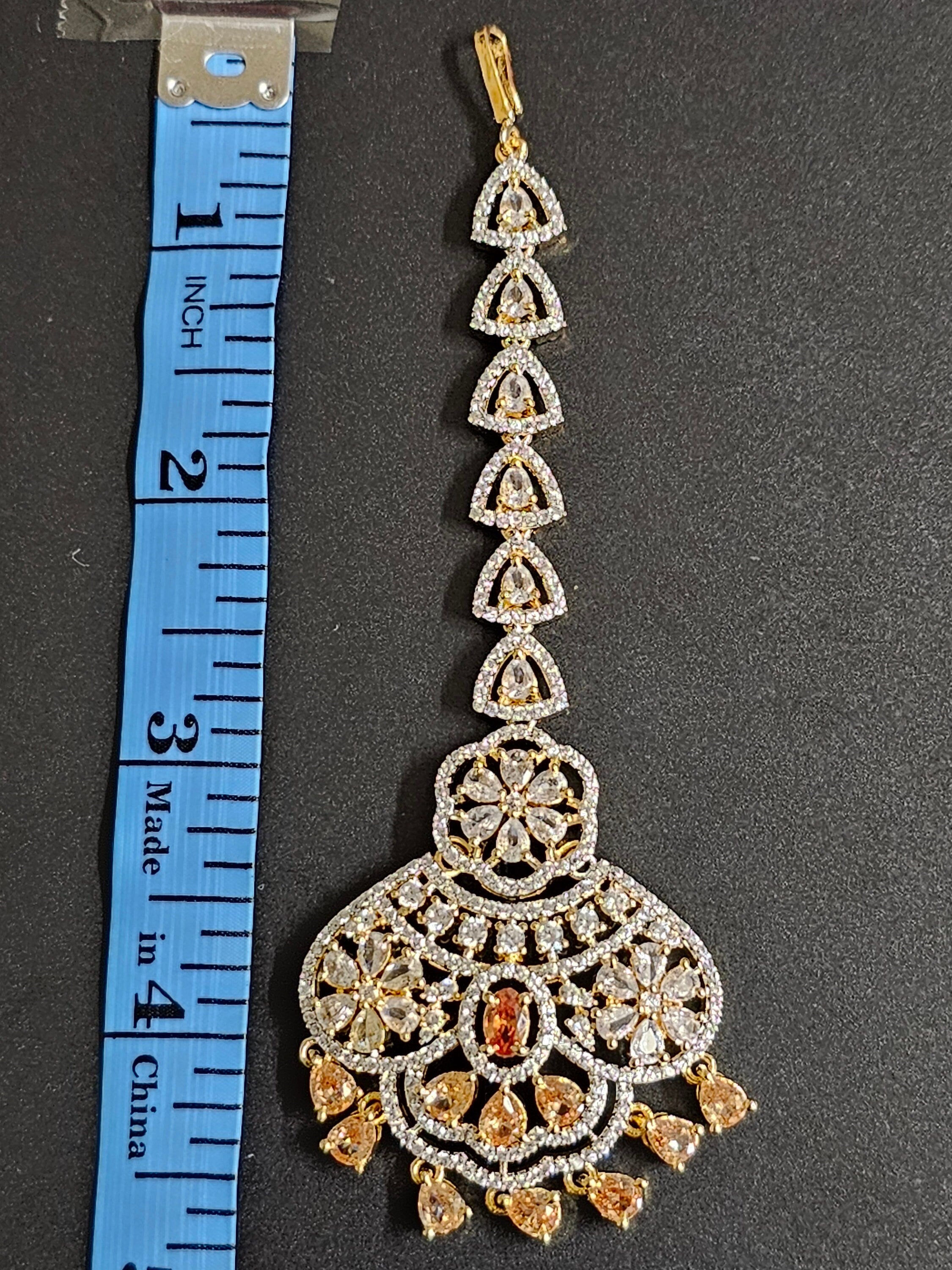 AD stone with Diamond finish with stone hangings Tikka/Nethichutti