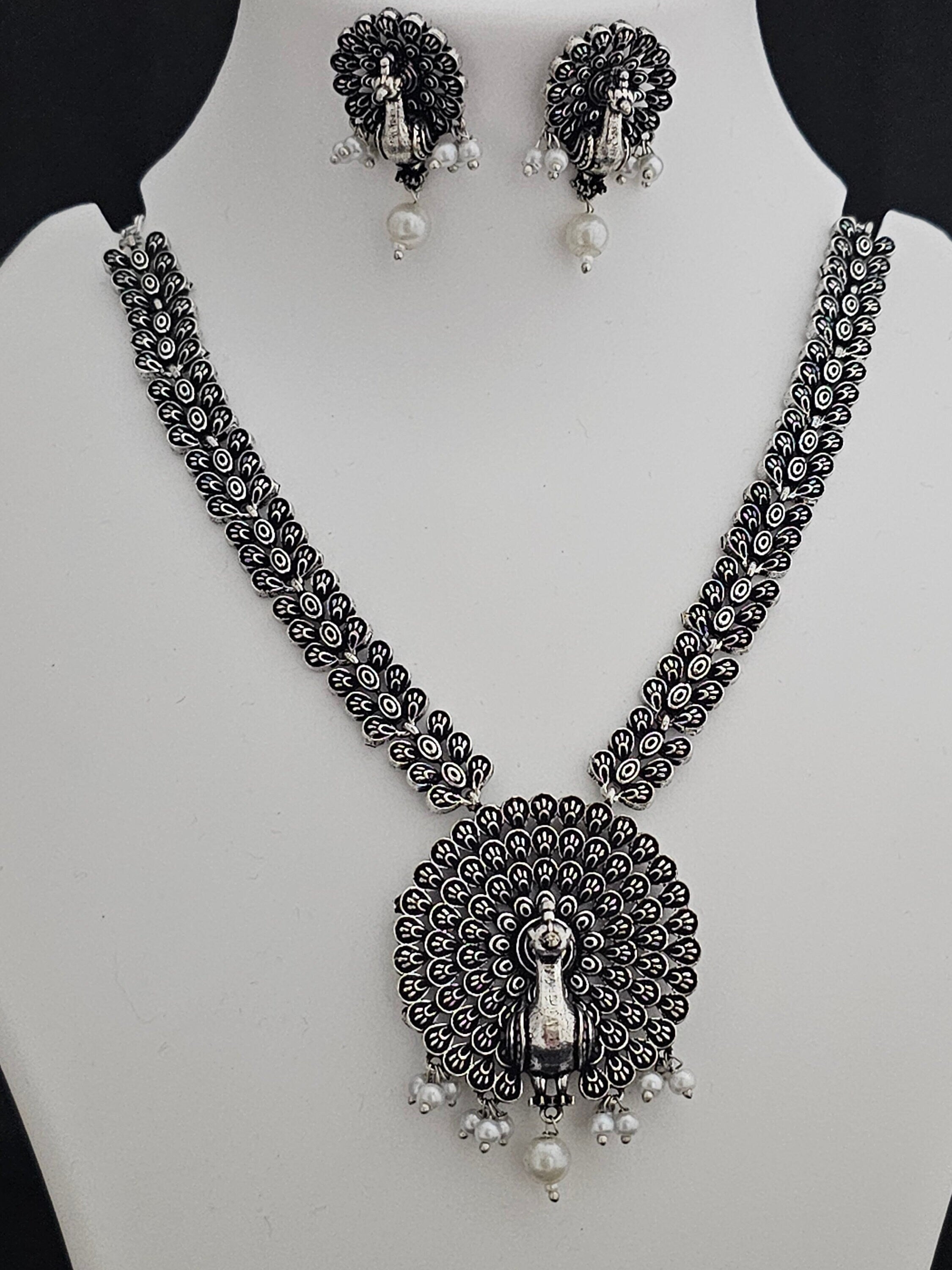 Peacock Oxidized Silver Middle Haram with matching Earrings