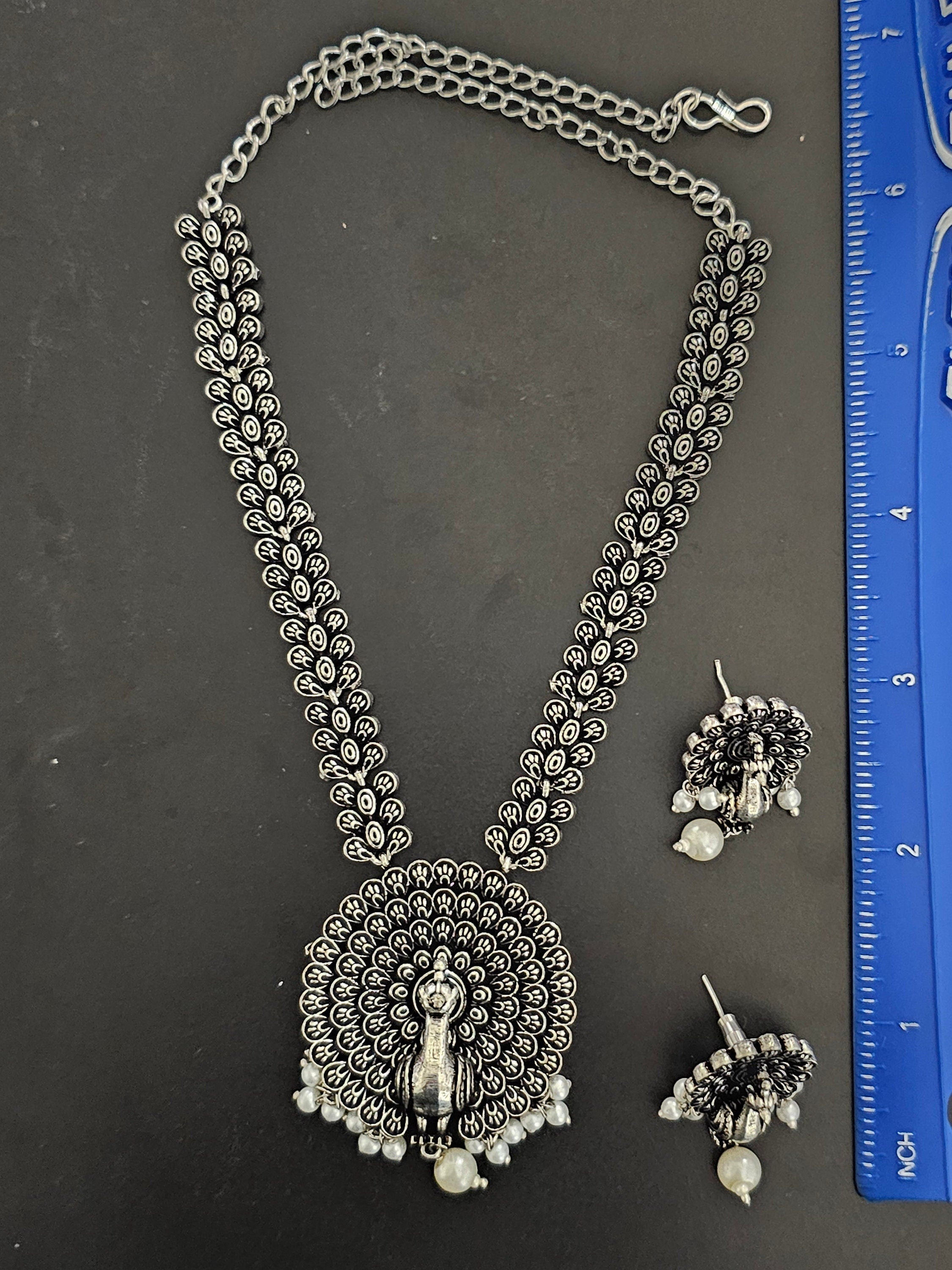 Peacock Oxidized Silver Middle Haram with matching Earrings