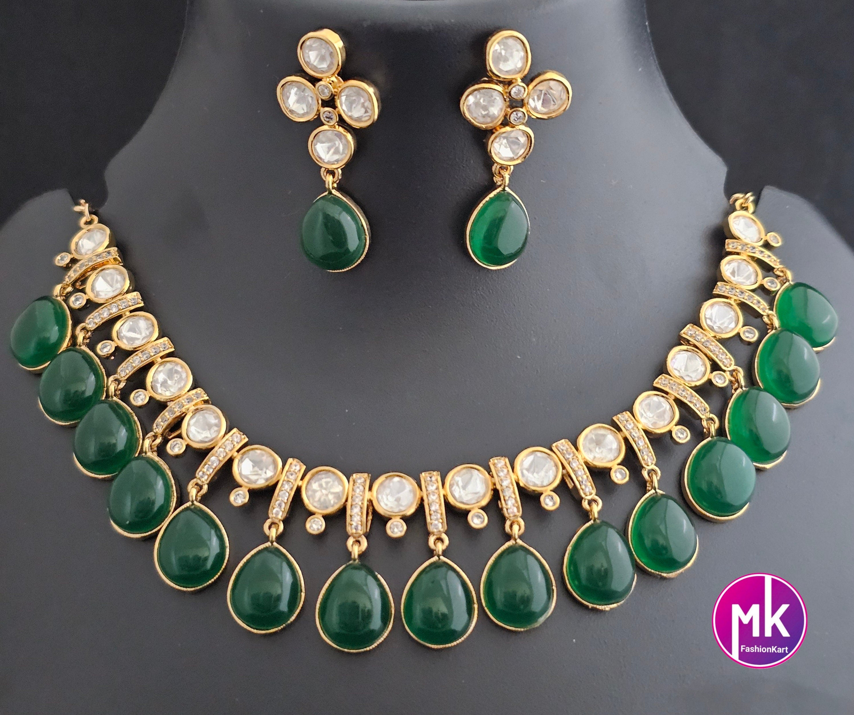 Polki stone Premium Quality Gold polish Necklace with Emerald Hangings and matching polki stone Emerald hanging Earrings