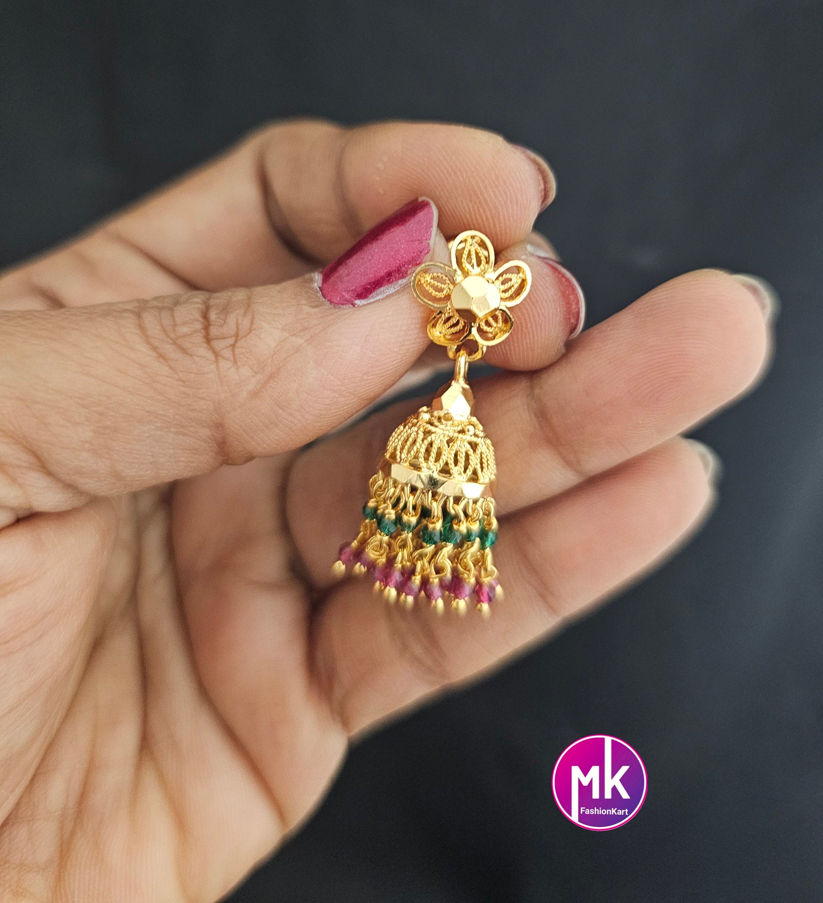Gold finish Flower design Jhumka with hanging crystals and gold beads