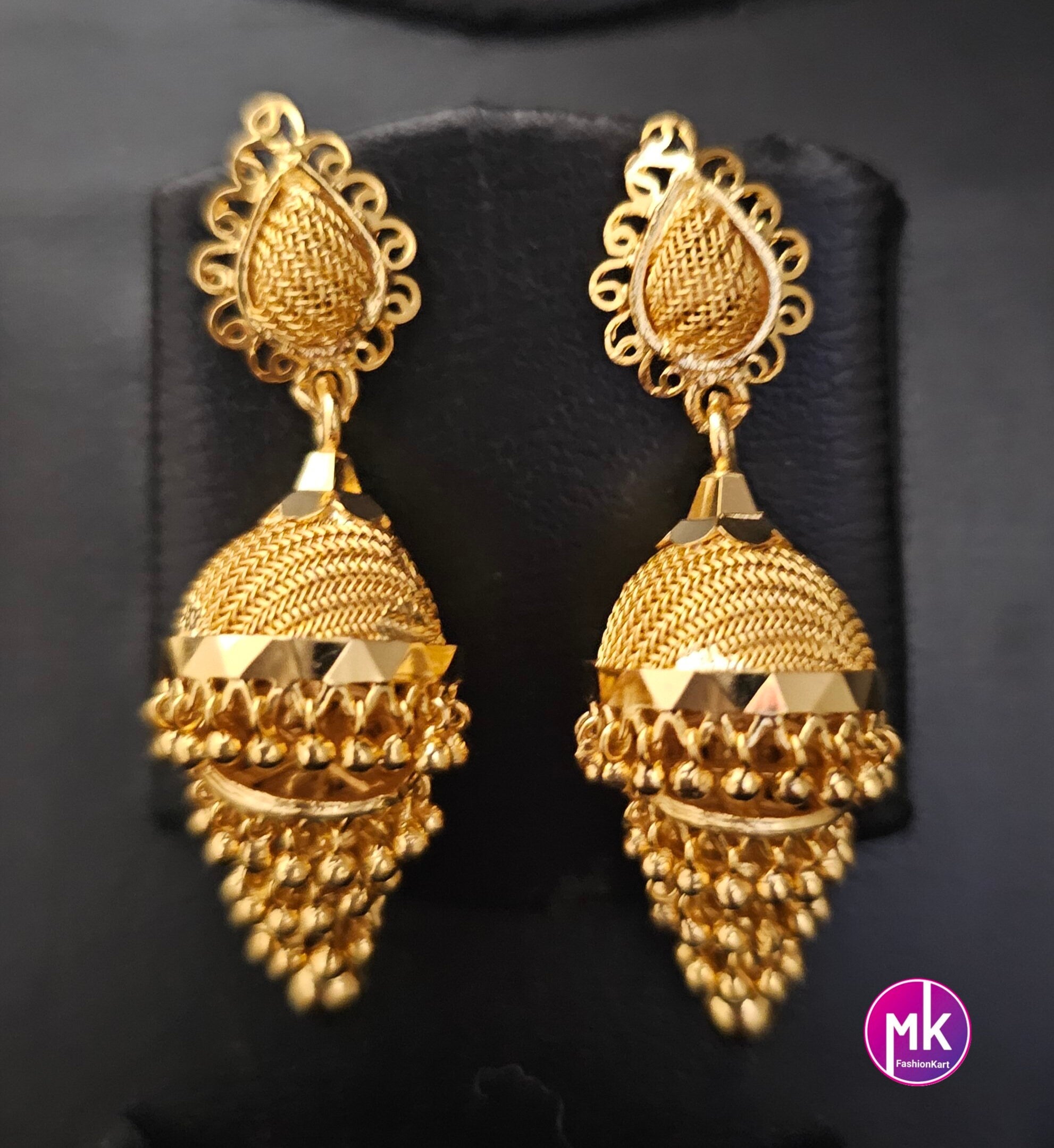 Beautiful Gold finish Multi-layer Jhumka with hanging gold beads