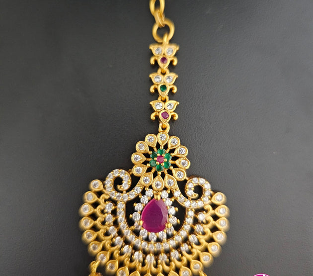 Flower design matte gold finish AD stone with gold ball hanging hangings Tikka/Nethichutti