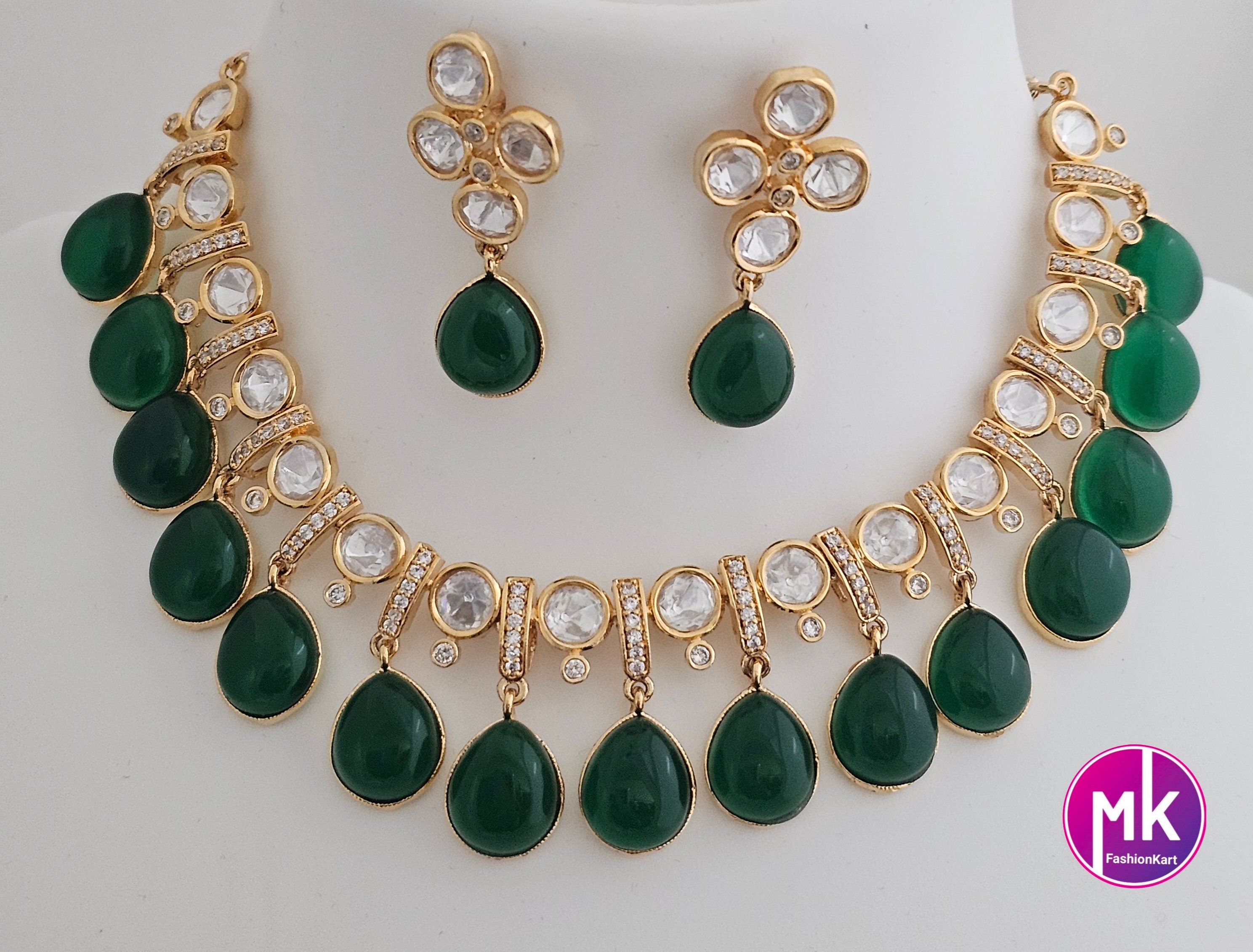 Polki stone Premium Quality Gold polish Necklace with Emerald Hangings and matching polki stone Emerald hanging Earrings