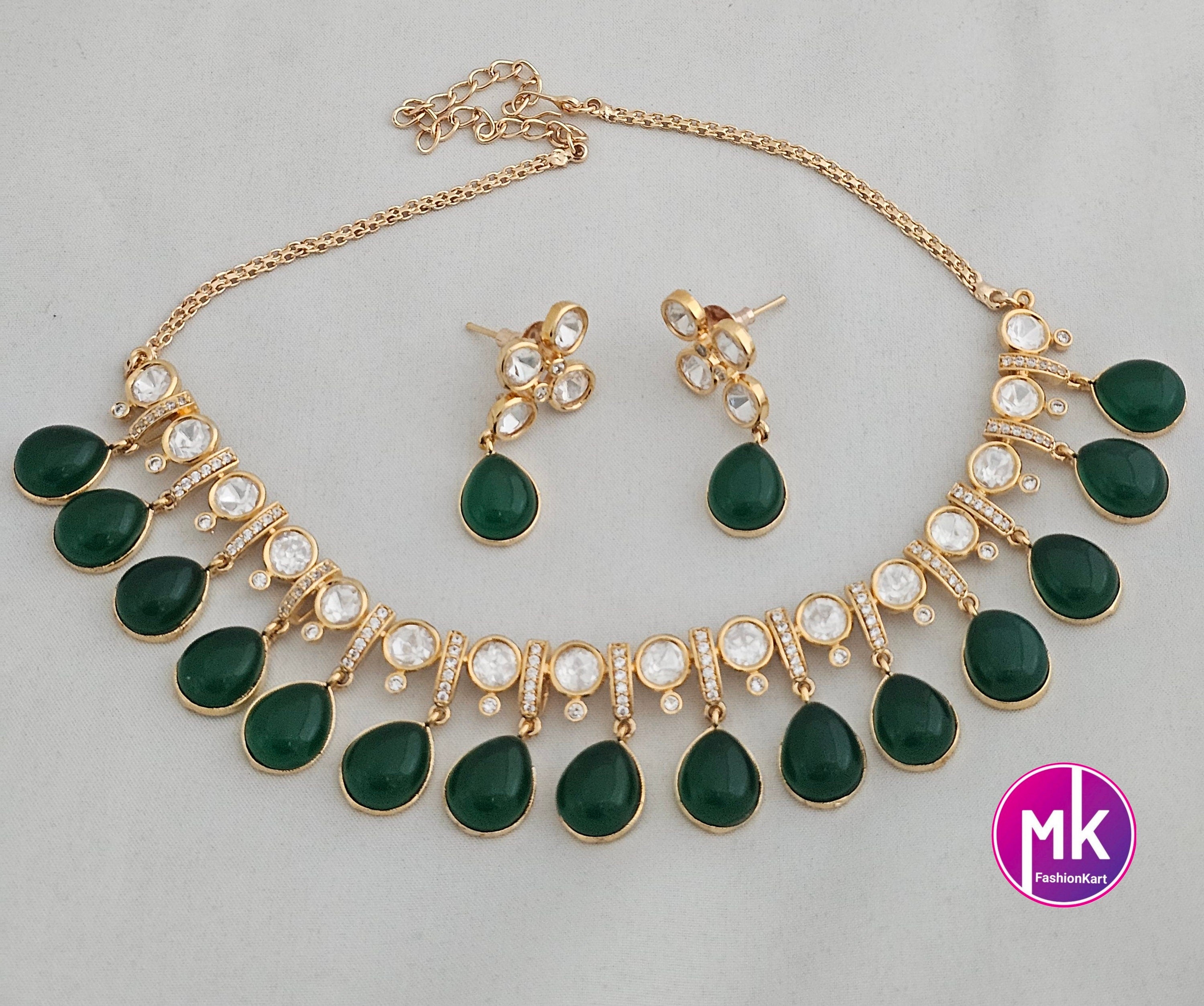 Polki stone Premium Quality Gold polish Necklace with Emerald Hangings and matching polki stone Emerald hanging Earrings