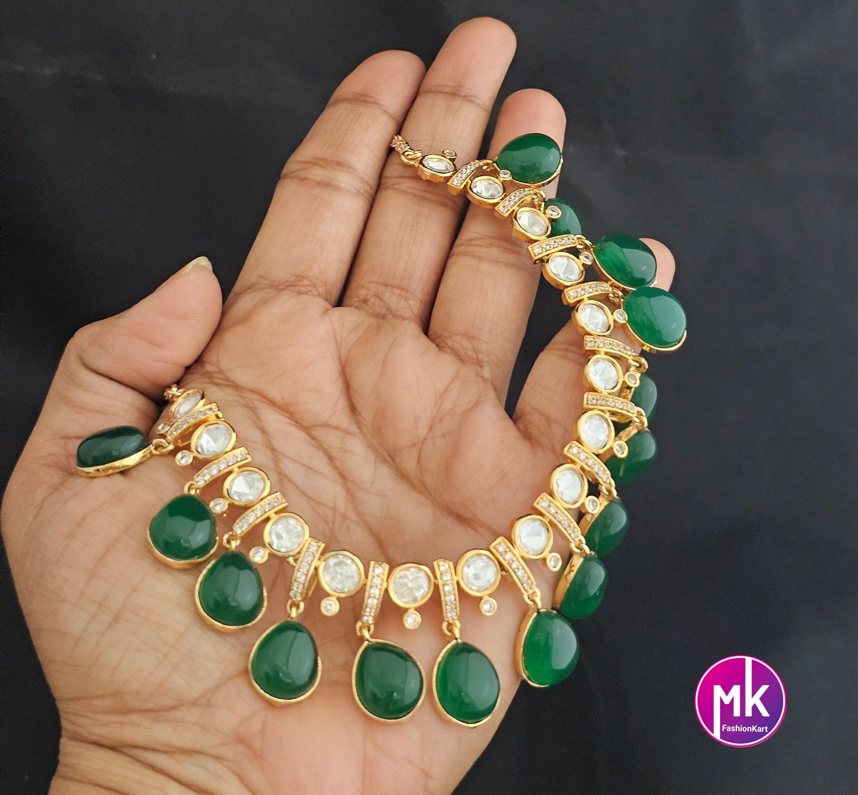 Polki stone Premium Quality Gold polish Necklace with Emerald Hangings and matching polki stone Emerald hanging Earrings