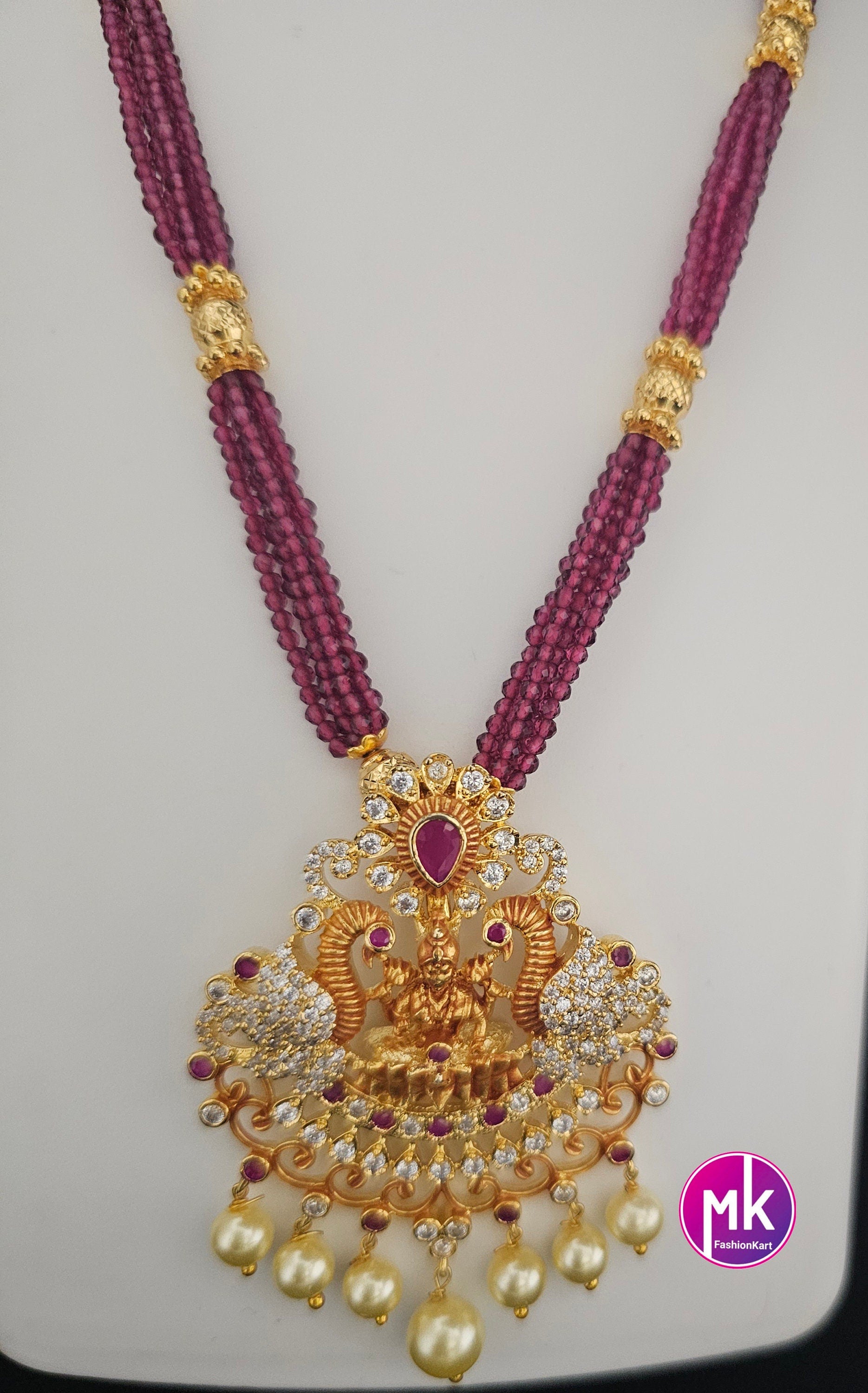 Lakshmi Peacock design AD Pendent with multi-layer crystal Mala and Matching AD stone Earrings