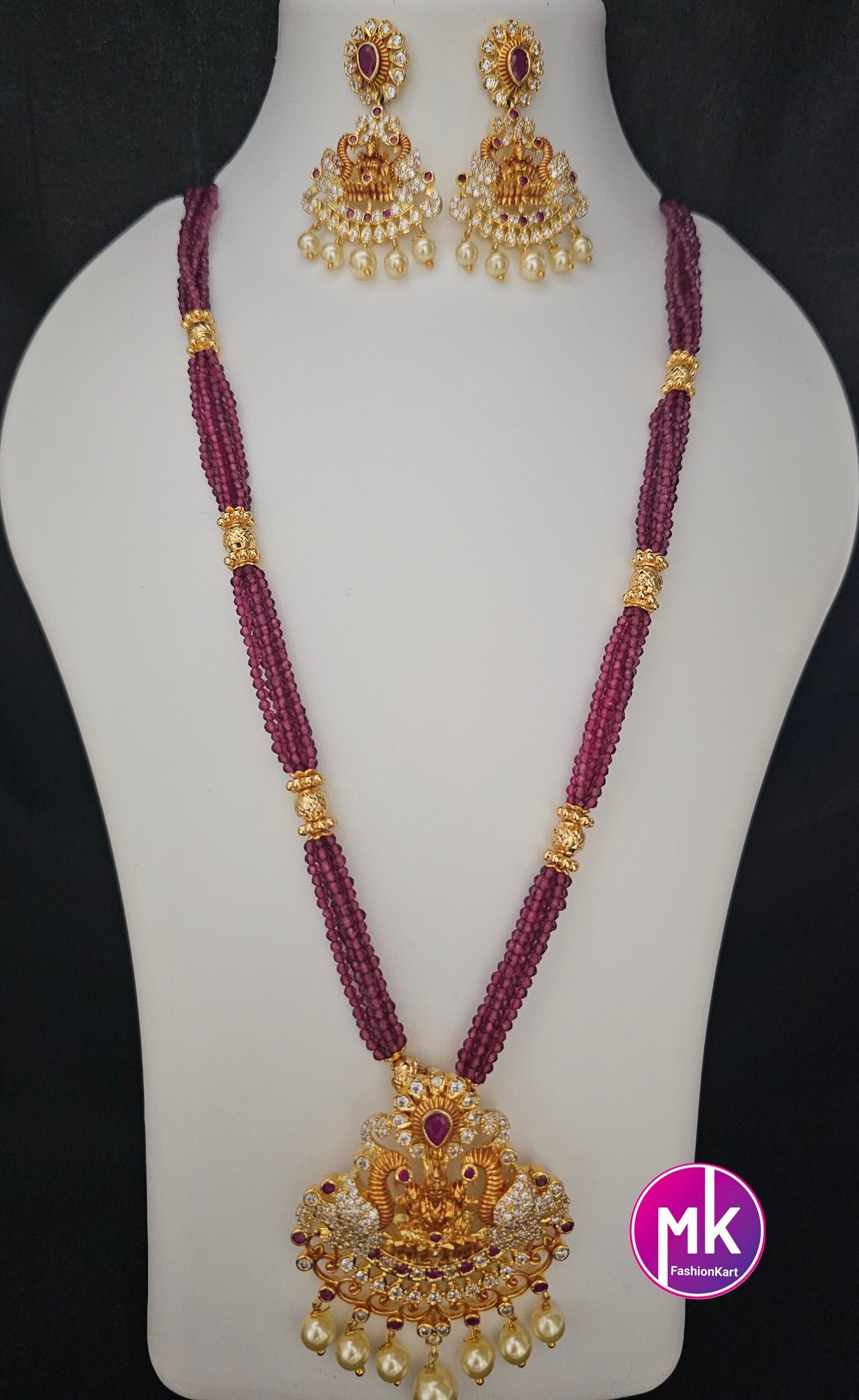 Lakshmi Peacock design AD Pendent with multi-layer crystal Mala and Matching AD stone Earrings