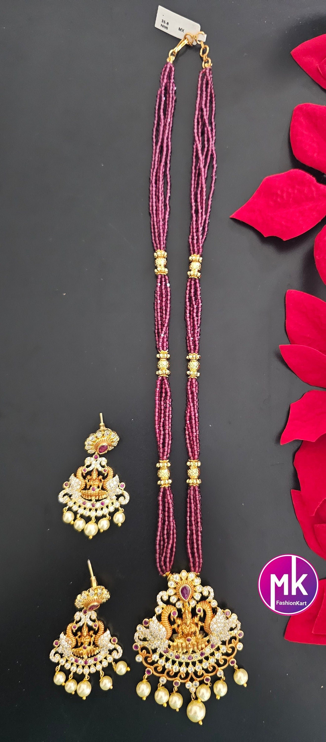 Lakshmi Peacock design AD Pendent with multi-layer crystal Mala and Matching AD stone Earrings