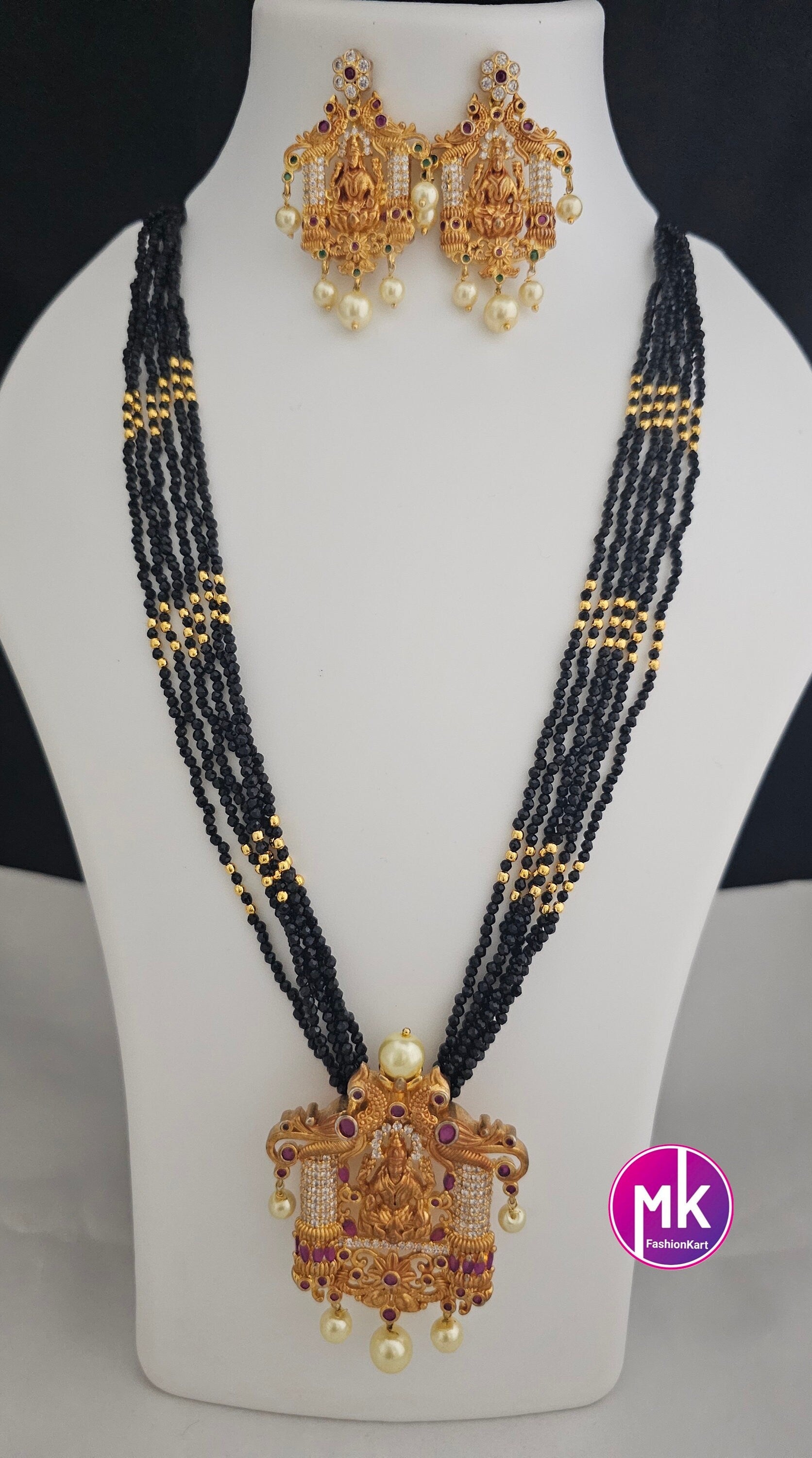 Lakshmi Peacock design AD Pendent with multi-layer crystal Mala and Matching AD stone Earrings