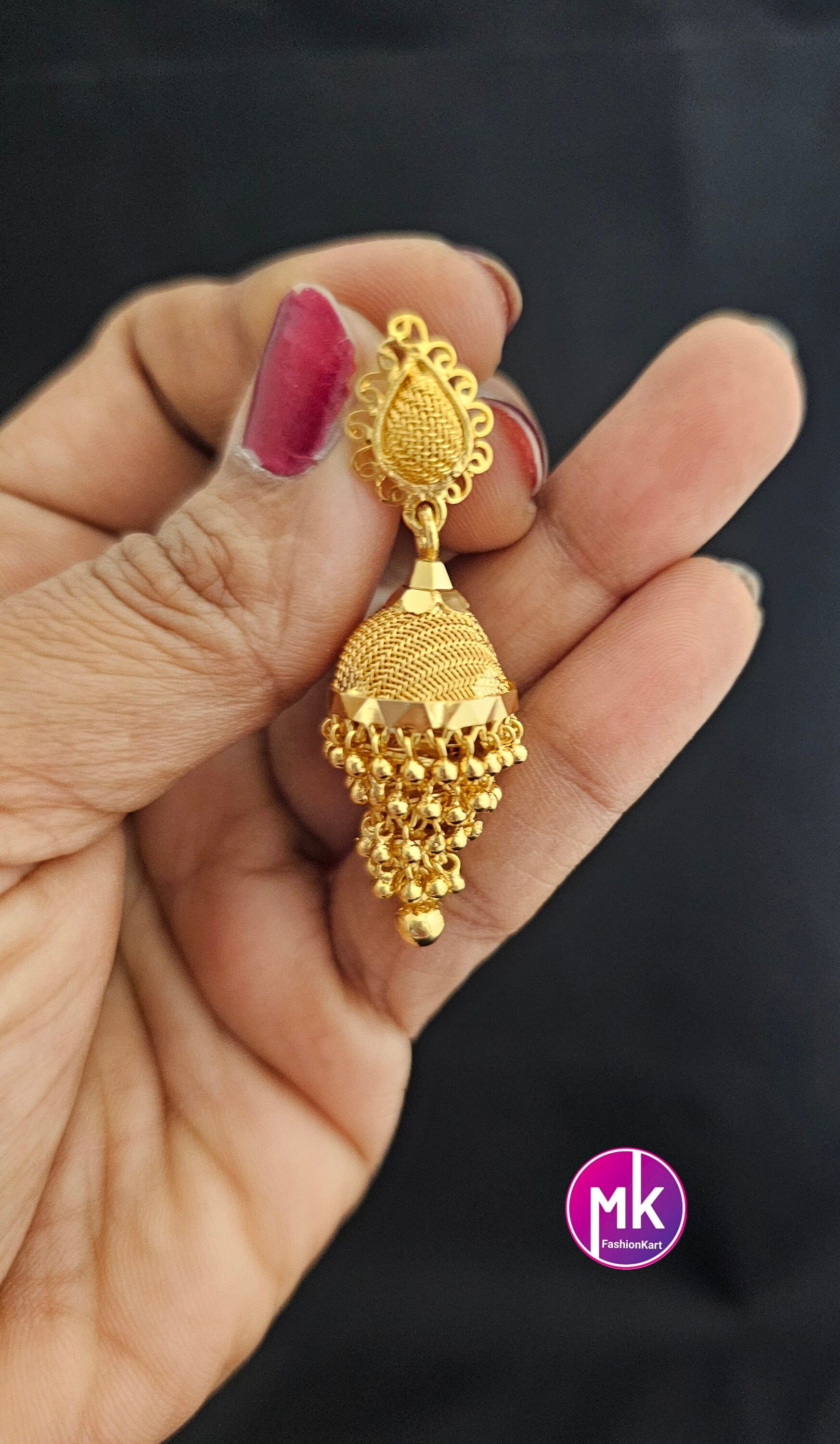 Beautiful Gold finish Multi-layer Jhumka with hanging gold beads