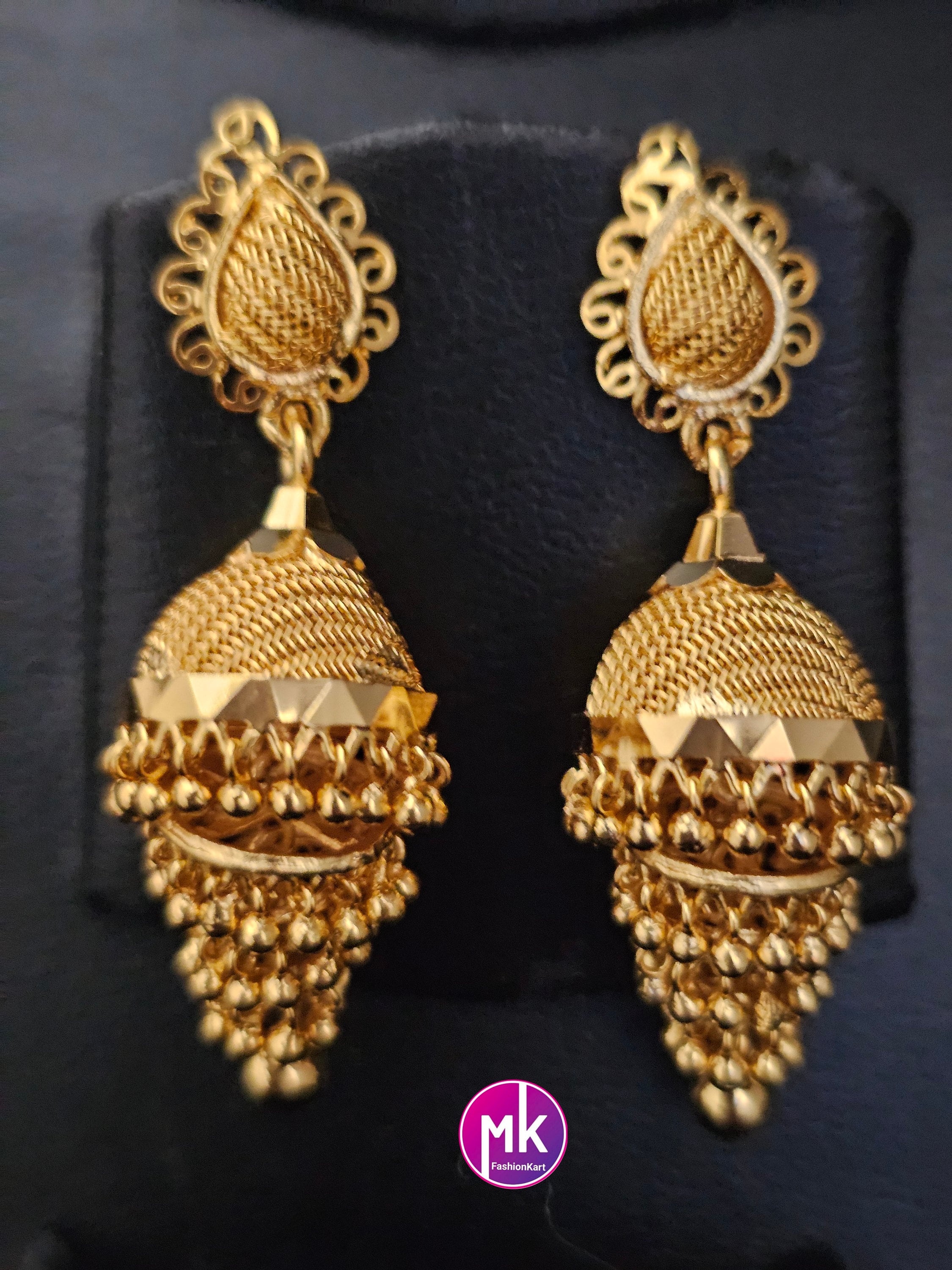 Beautiful Gold finish Multi-layer Jhumka with hanging gold beads