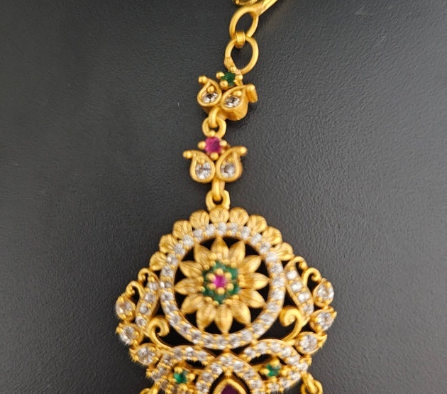 Flower design matte gold finish AD stone with gold ball hanging hangings Tikka/Nethichutti