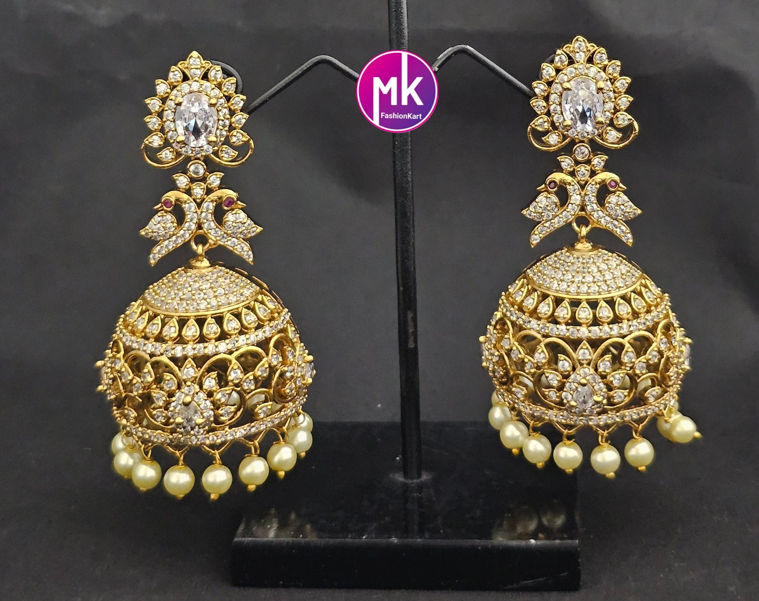 Premium Quality premium polish Big Jhumka with white cz stones and hangings pearls