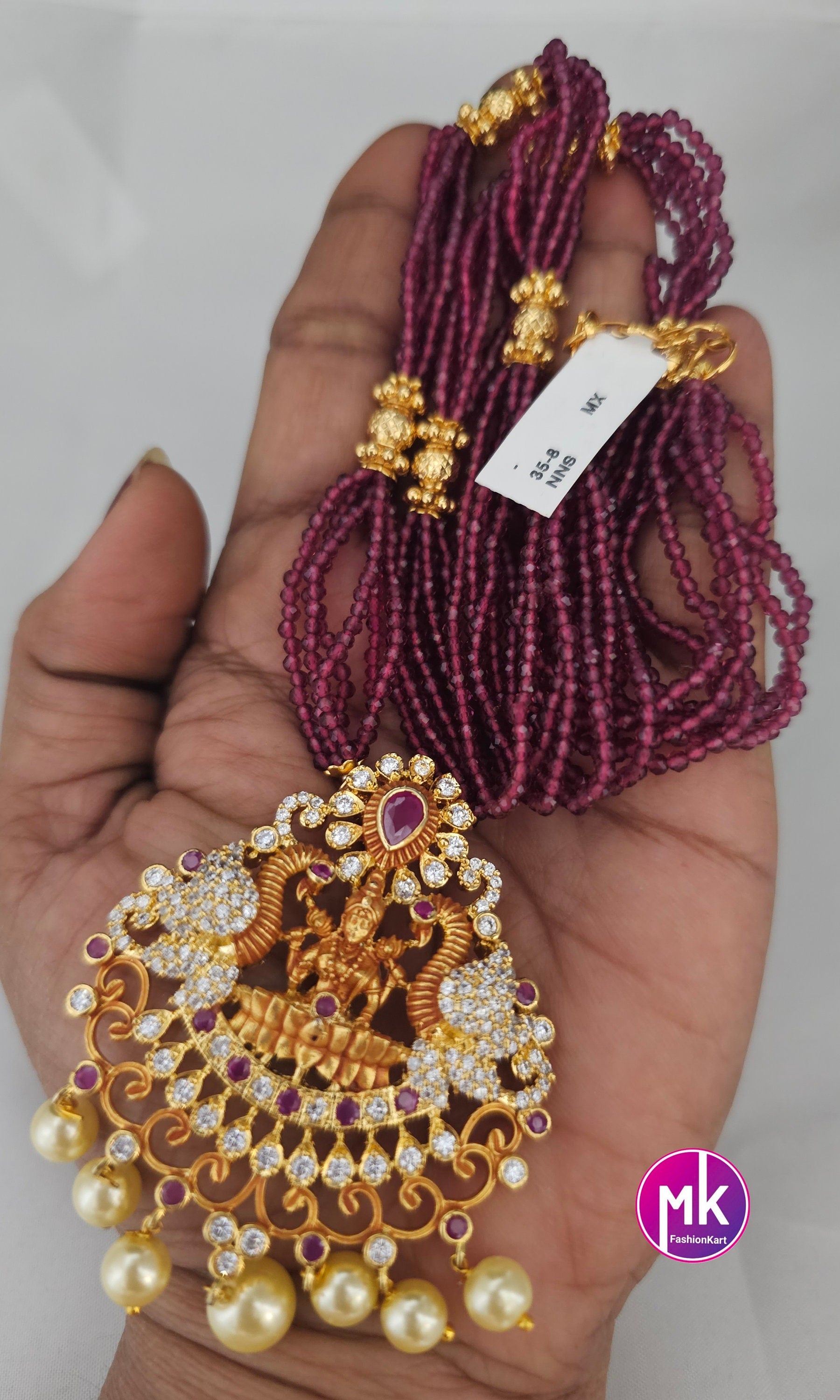 Lakshmi Peacock design AD Pendent with multi-layer crystal Mala and Matching AD stone Earrings