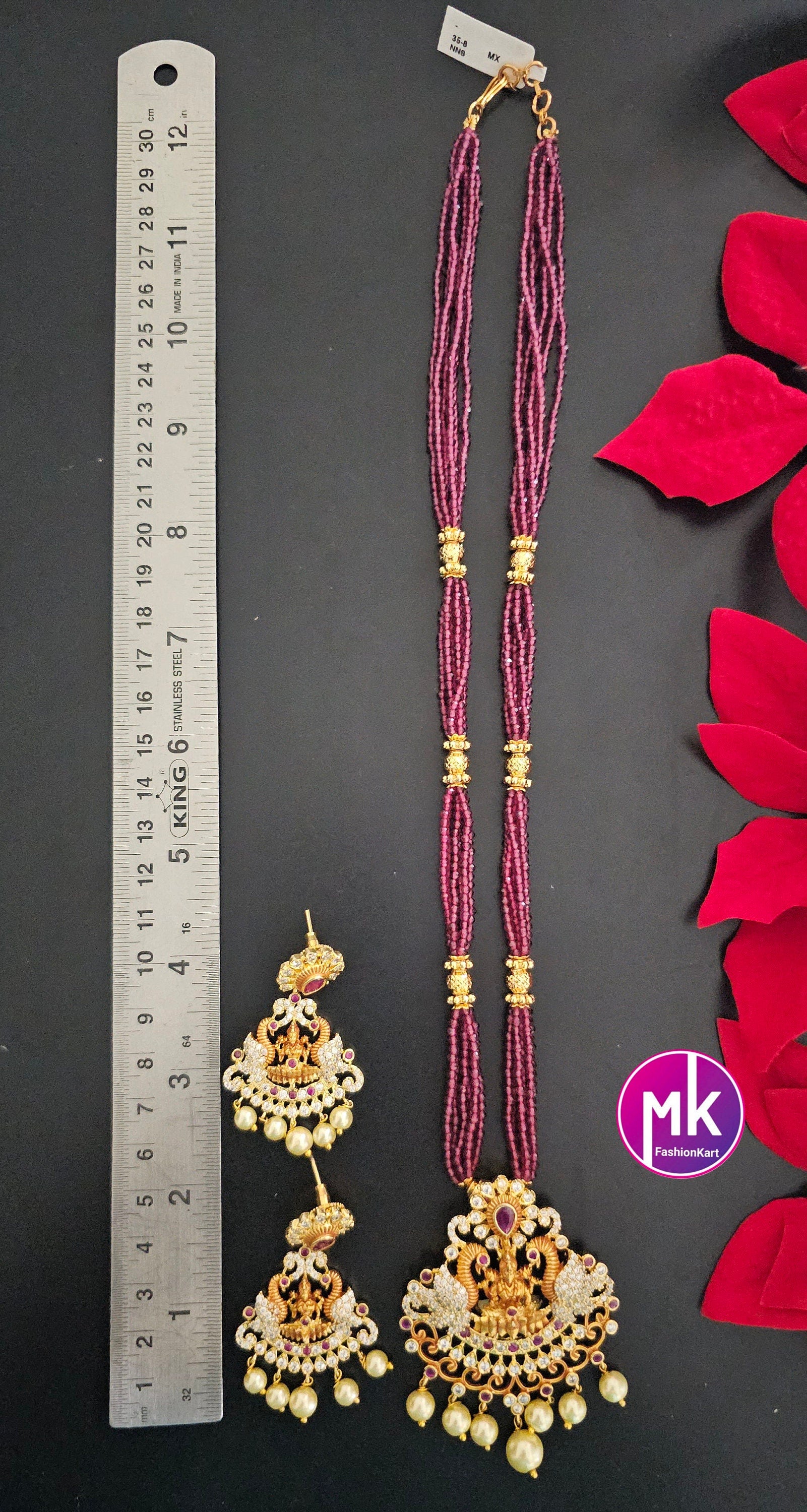 Lakshmi Peacock design AD Pendent with multi-layer crystal Mala and Matching AD stone Earrings