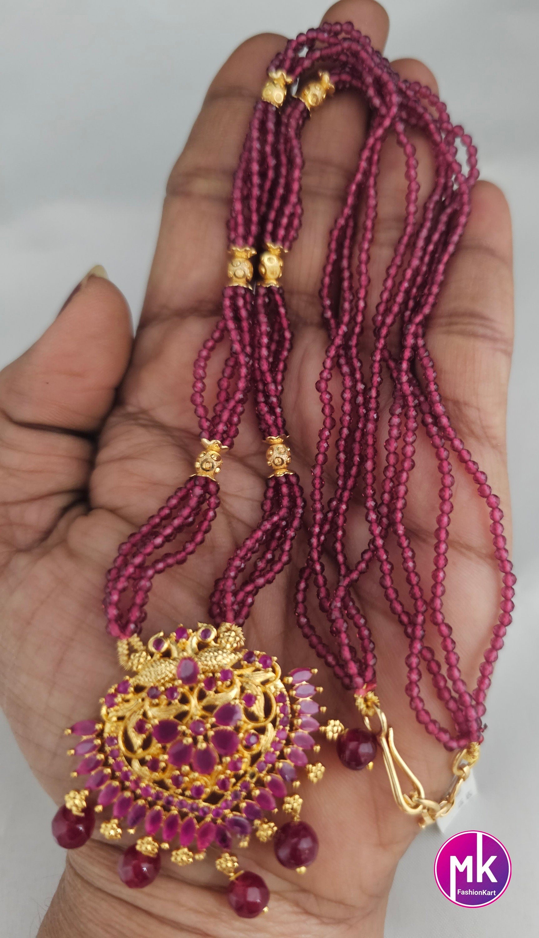 Gold finish Ruby pendent with multi-layer crystal Mala