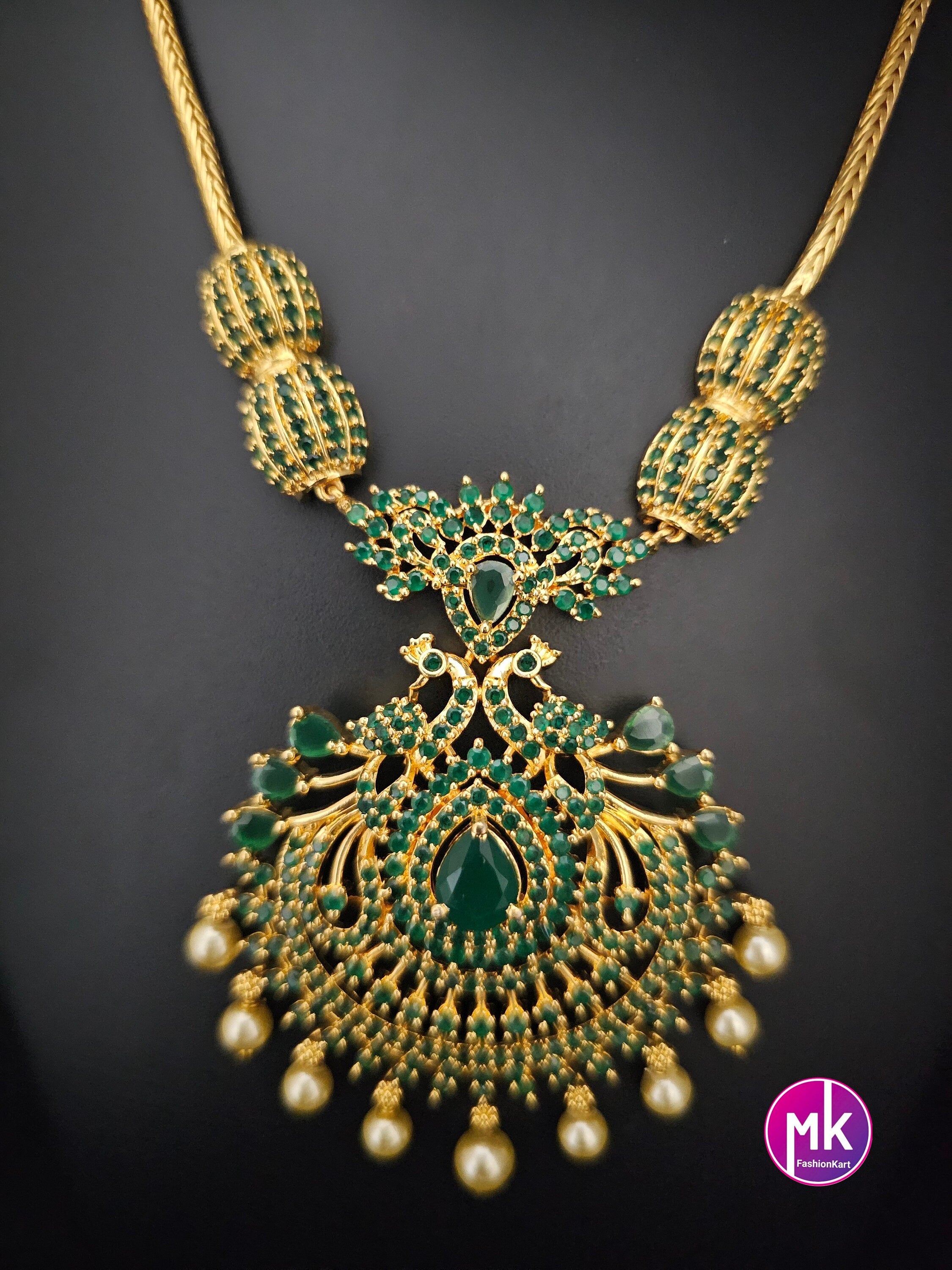 Premium Gold finish Peacock AD Emerald Stone Necklace with matching Earrings