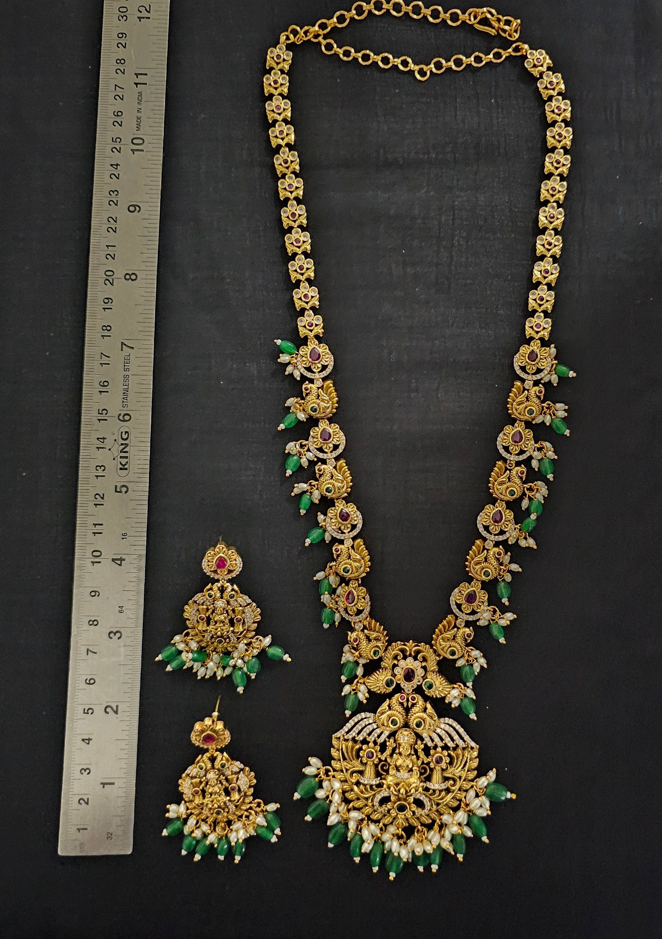 Lakshmi Peacock Premium quality Gold Jewelry Replica Haram with Precious green bead hangings with matching Earrings