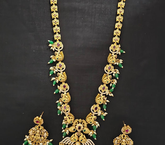 Lakshmi Peacock Premium quality Gold Jewelry Replica Haram with Precious green bead hangings with matching Earrings